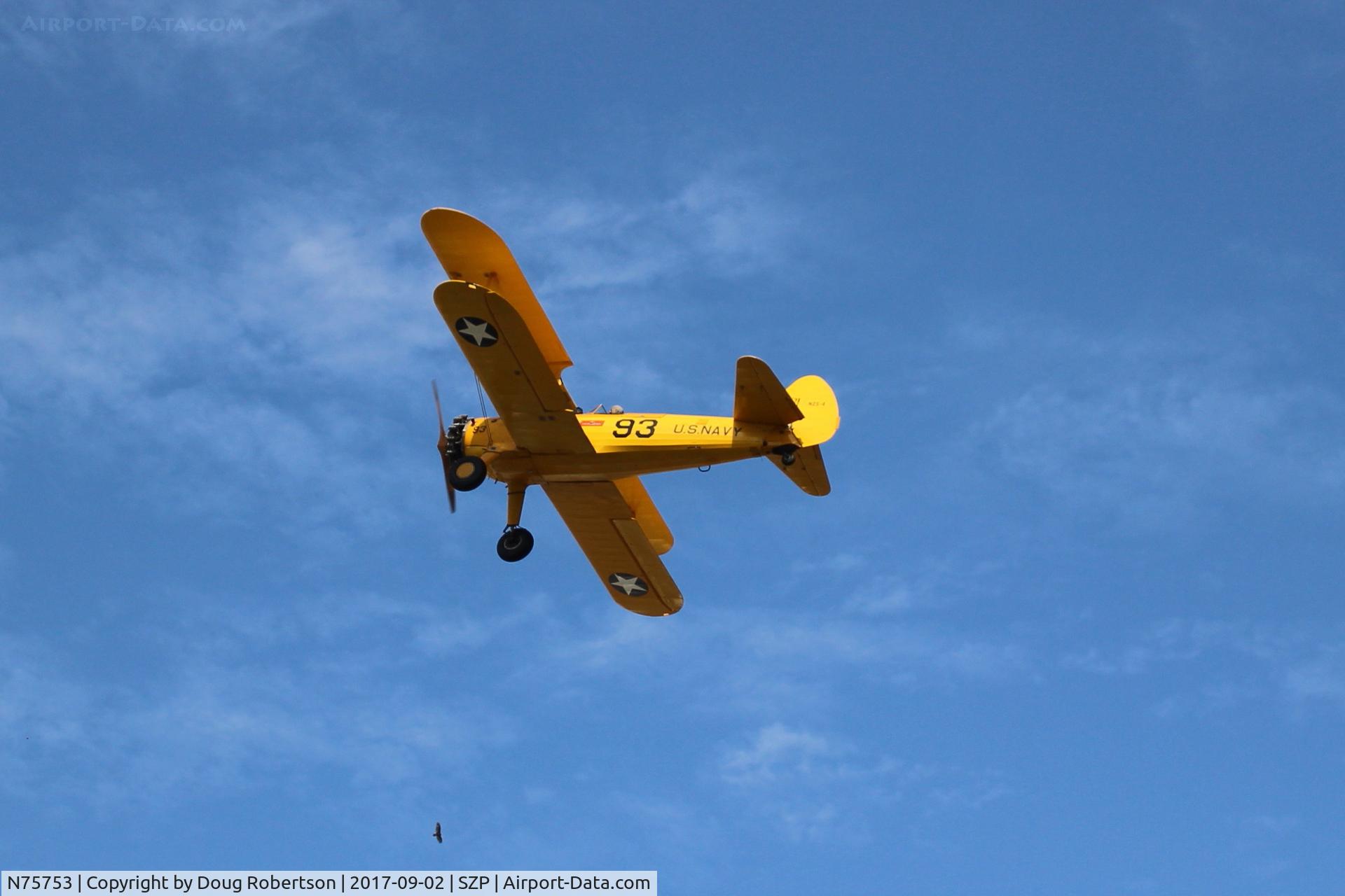 N75753, 1942 Boeing A75N1 (PT17) C/N 75-3521, 1942 Boeing Stearman A75N1 (PT-17) as Navy N2S-4 basic trainer, Continental W670 220 Hp radial, takeoff climb Rwy 22