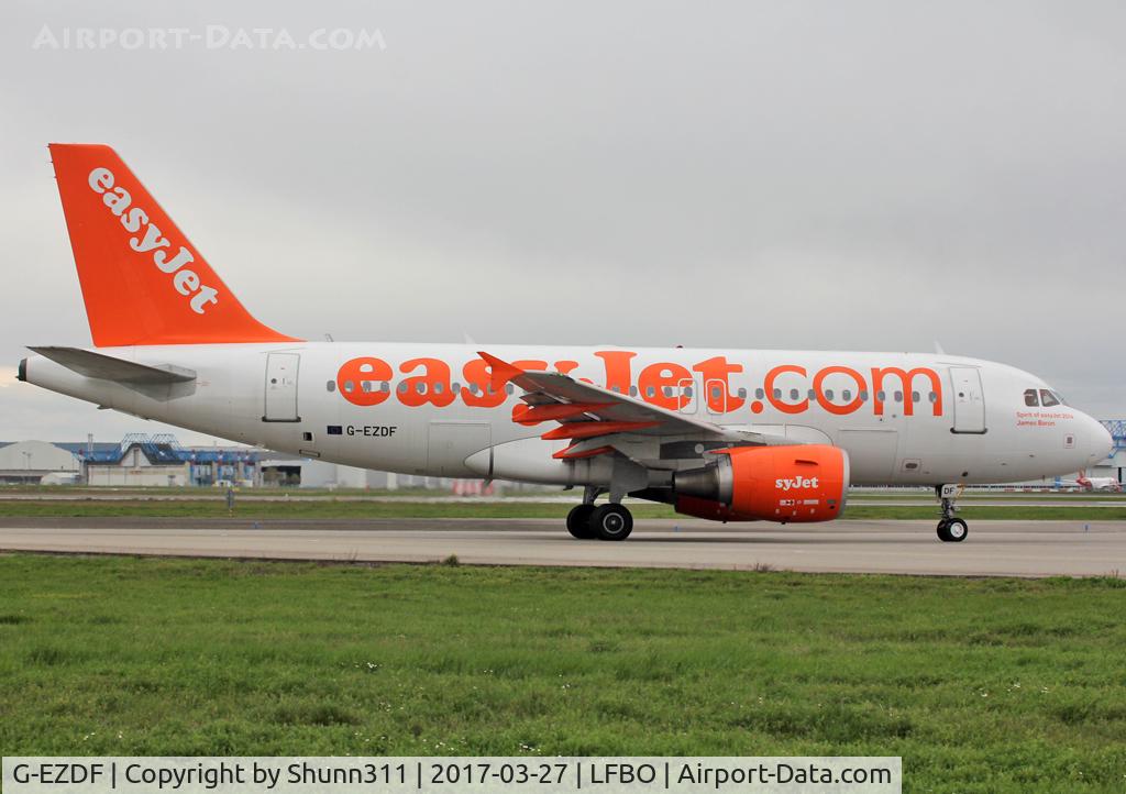 G-EZDF, 2008 Airbus A319-111 C/N 3432, Taxiing holding point rwy 14L for departure with additional 'Spirit of Easyjet 2014 - James Baron' titles