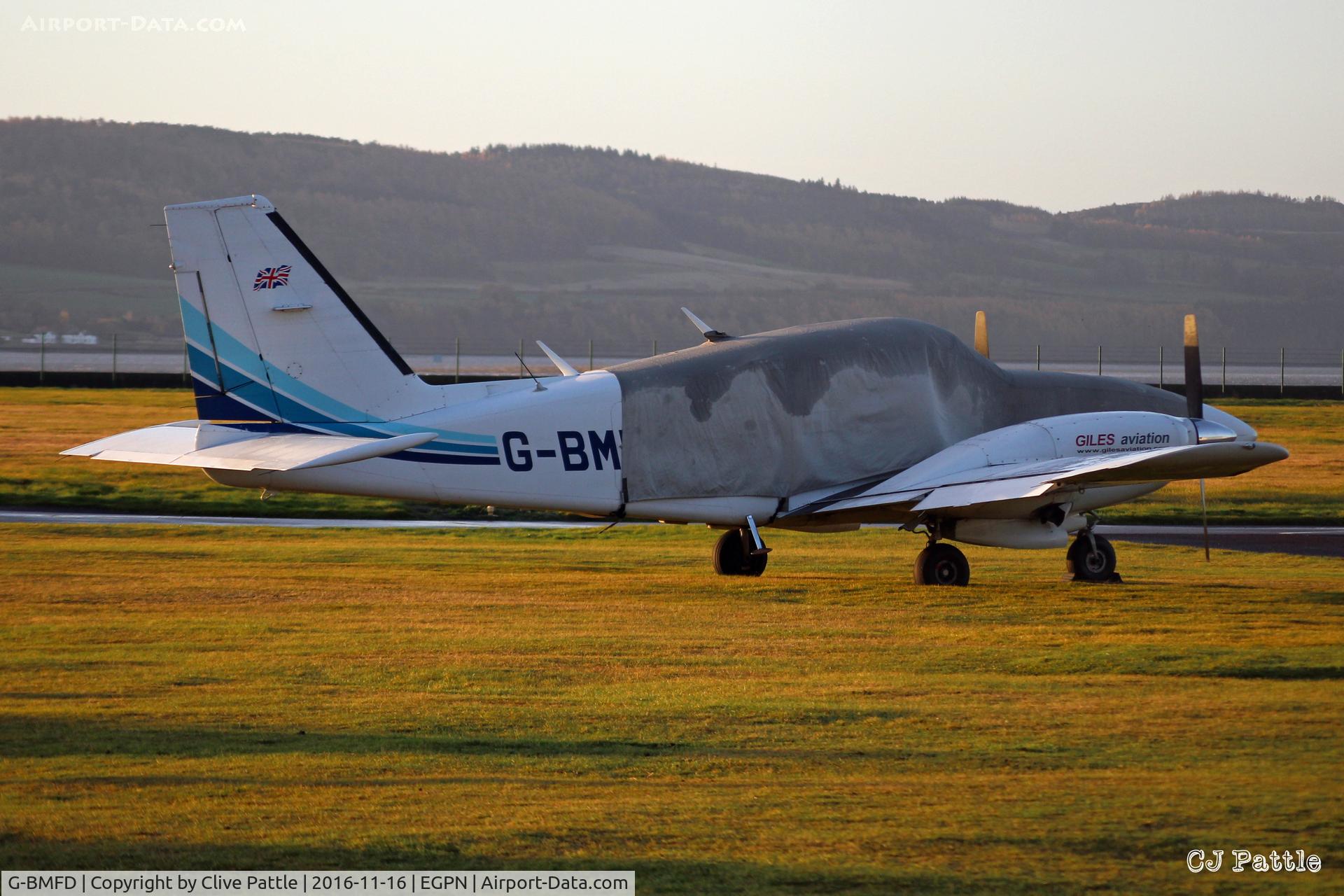 G-BMFD, 1979 Piper PA-23-250 Aztec F C/N 27-7954080, Under cover at Dundee