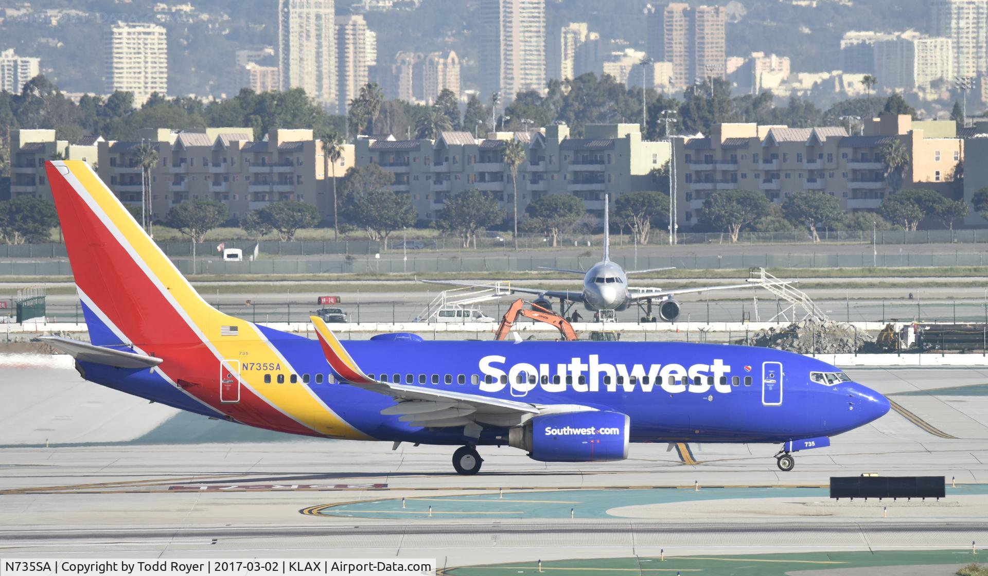 N735SA, 1999 Boeing 737-7H4 C/N 27867, Taxiing for departure at LAX
