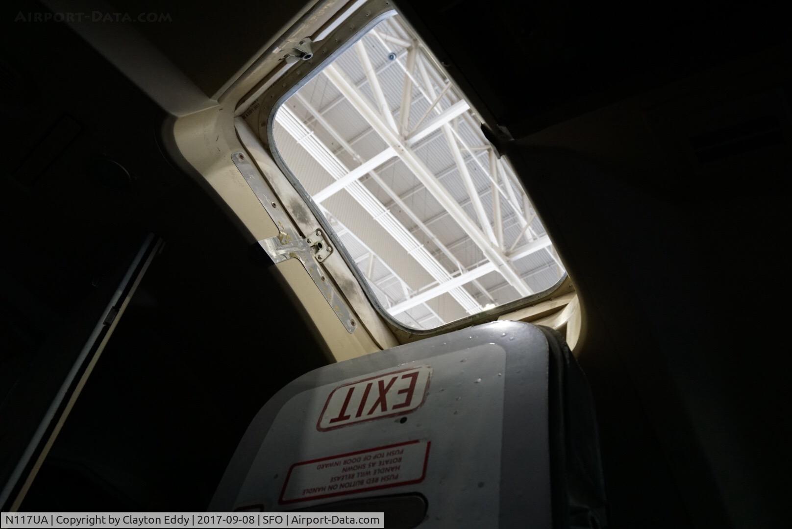 N117UA, 1999 Boeing 747-422 C/N 28810, Flightdeck emergency exit SFO 2017.