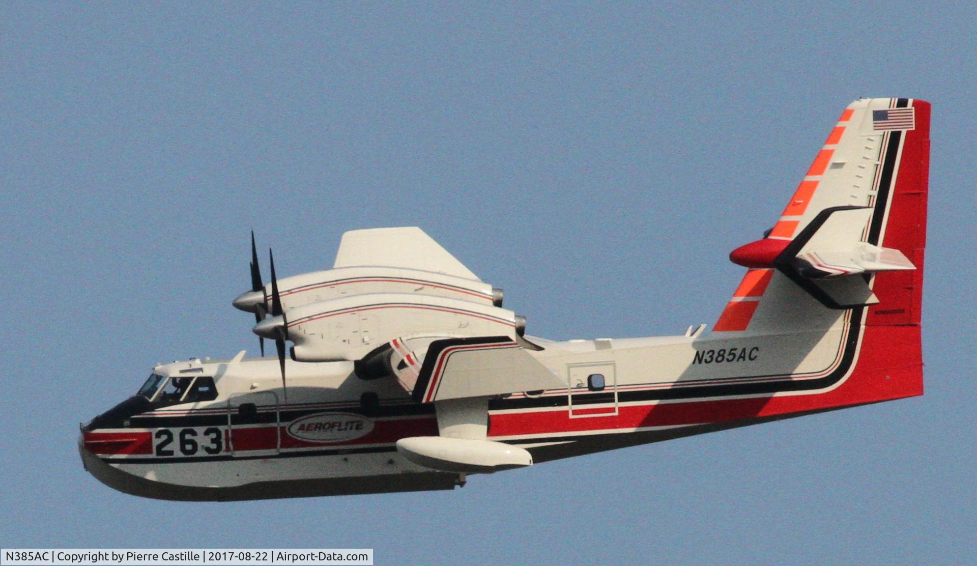 N385AC, 2015 Bombardier CL-415 (CL-215-6B11) C/N 2095, Picking up water from the Columbia River upstream of the Bonneville Dam and depositing it on a nearby wild fire.