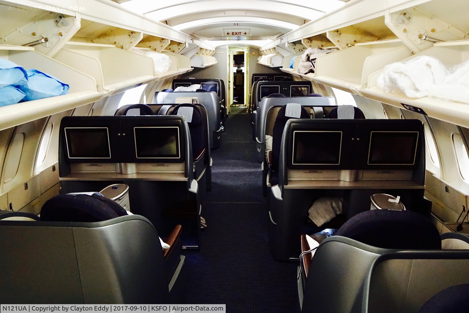 N121UA, 1999 Boeing 747-422 C/N 29167, Upper deck looking forward. SFO. 2017.