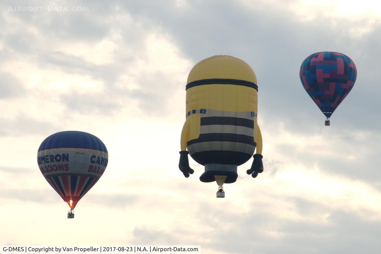 G-DMES, 2013 Cameron Minion-105 C/N 11739, Cameron Minion-105 special balloon between other balloons during Twente Ballooning 2017 at Oldenzaal, the Netherlands