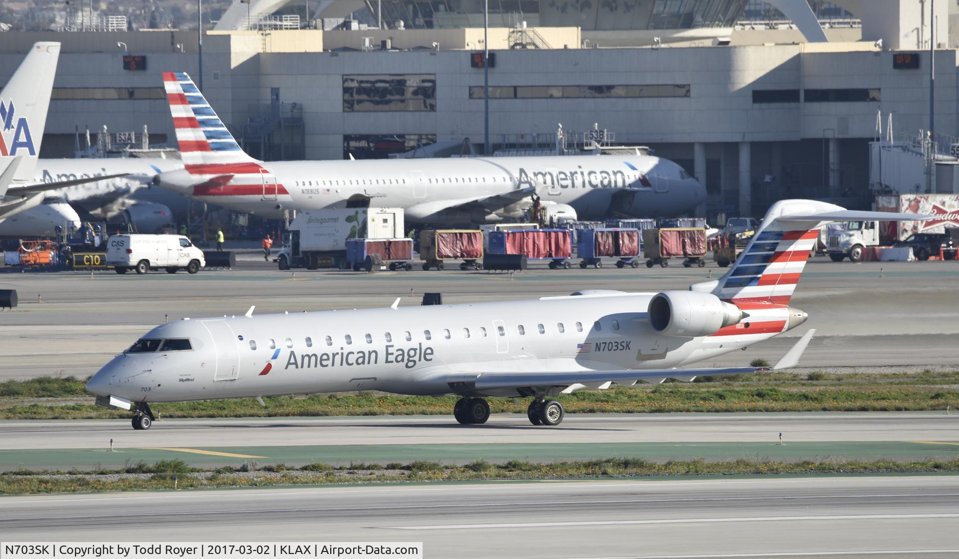 N703SK, 2004 Bombardier CRJ-701ER (CL-600-2C10) Regional Jet C/N 10139, Arrived at LAX on 25L