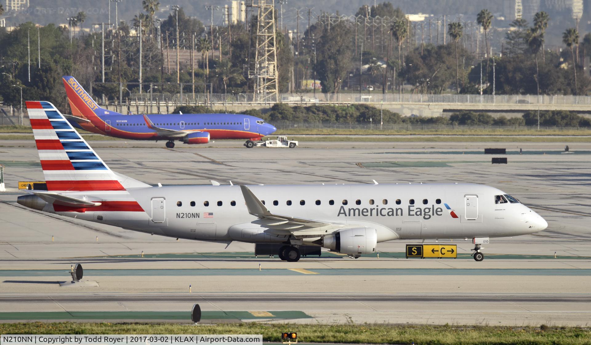 N210NN, 2015 Embraer 175LR (ERJ-170-200LR) C/N 17000500, Taxiing to gate at LAX