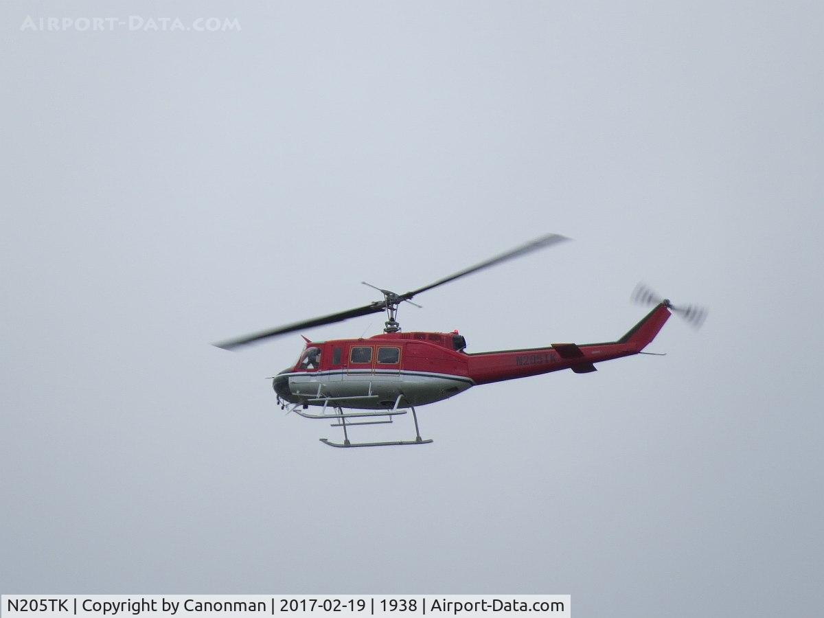 N205TK, 1973 Bell 205A-1 C/N 30131, Lifting off