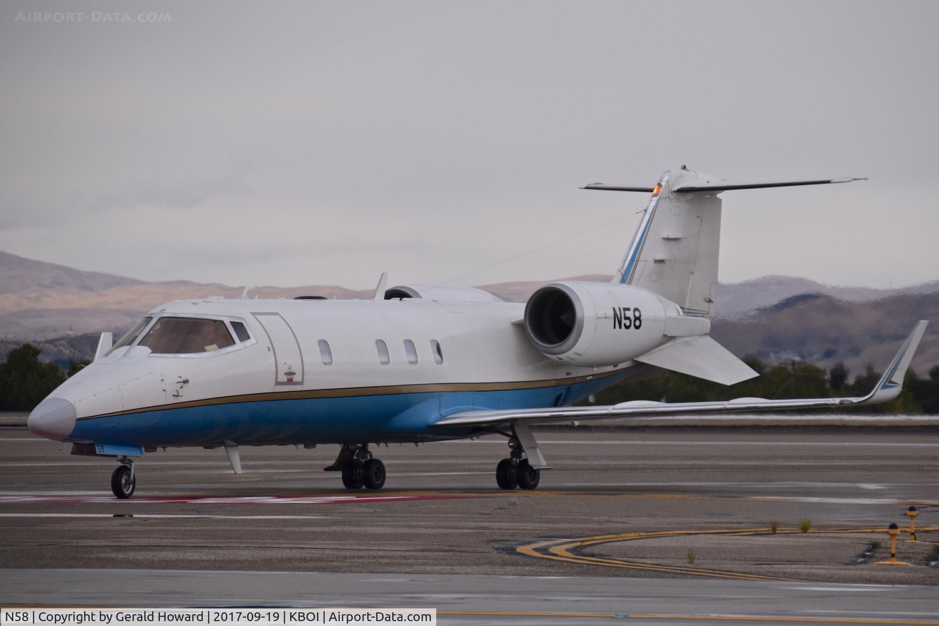 N58, 1995 Learjet Inc 60 C/N 057, Taxiing to the south GA ramp.
