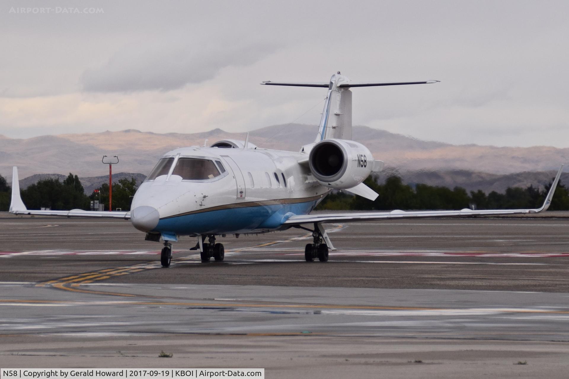 N58, 1995 Learjet Inc 60 C/N 057, Turning off RWY 28L.