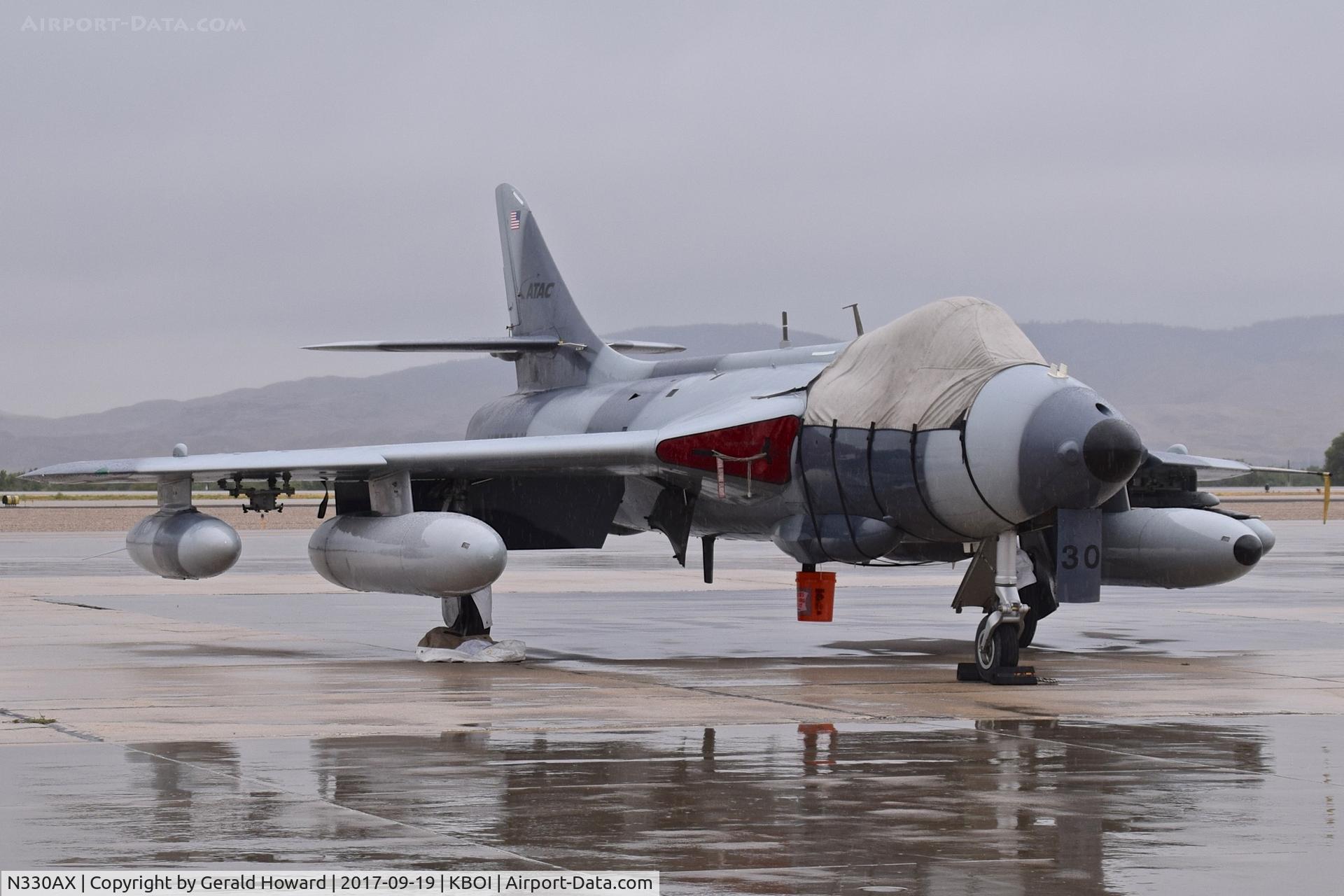 N330AX, Hawker Hunter F.58 C/N 41H-697457, One of 3 ATAC aircraft parked on the south GA ramp.