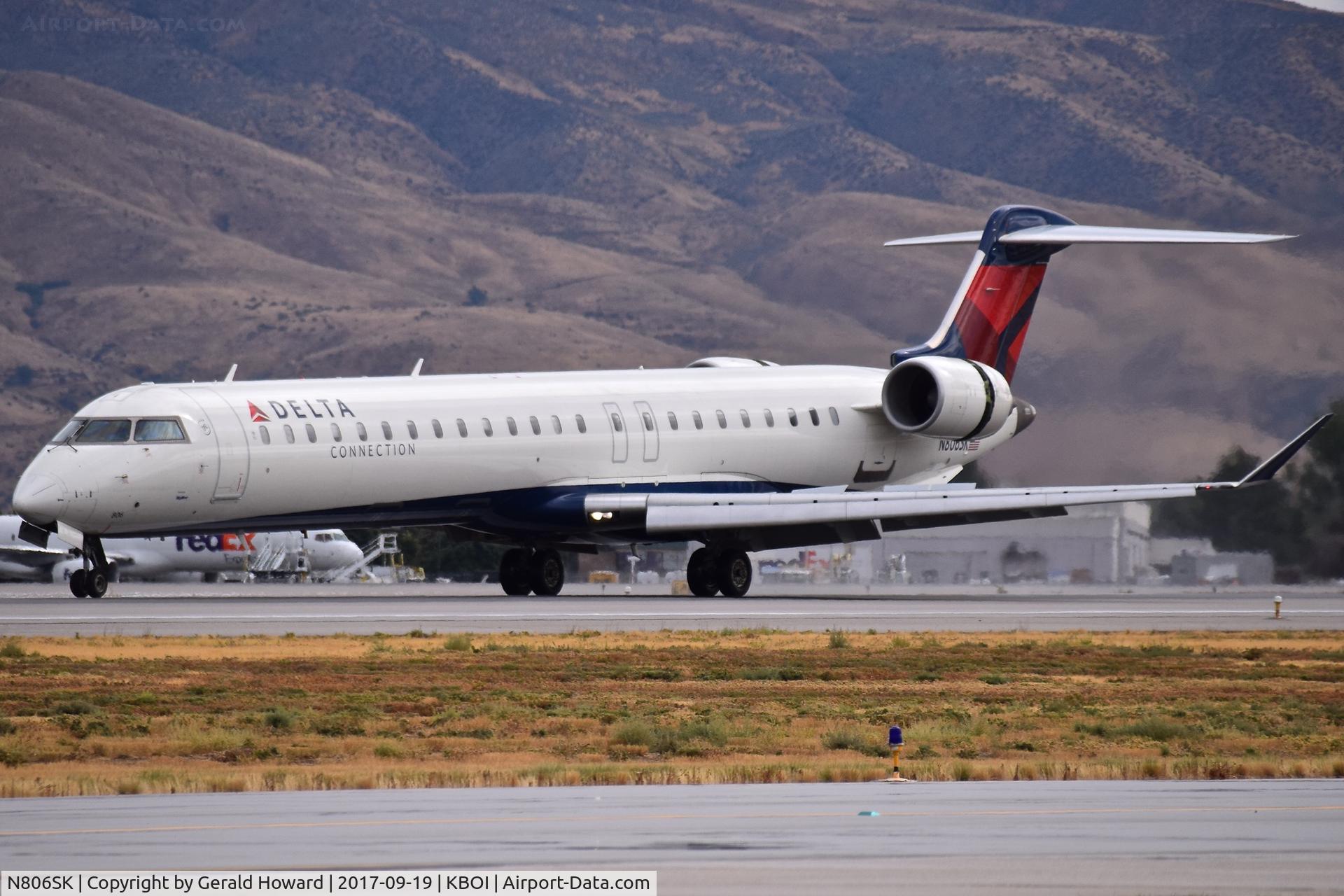 N806SK, 2006 Bombardier CRJ-900ER (CL-600-2D24) C/N 15070, Landing roll out on RWY 28L.