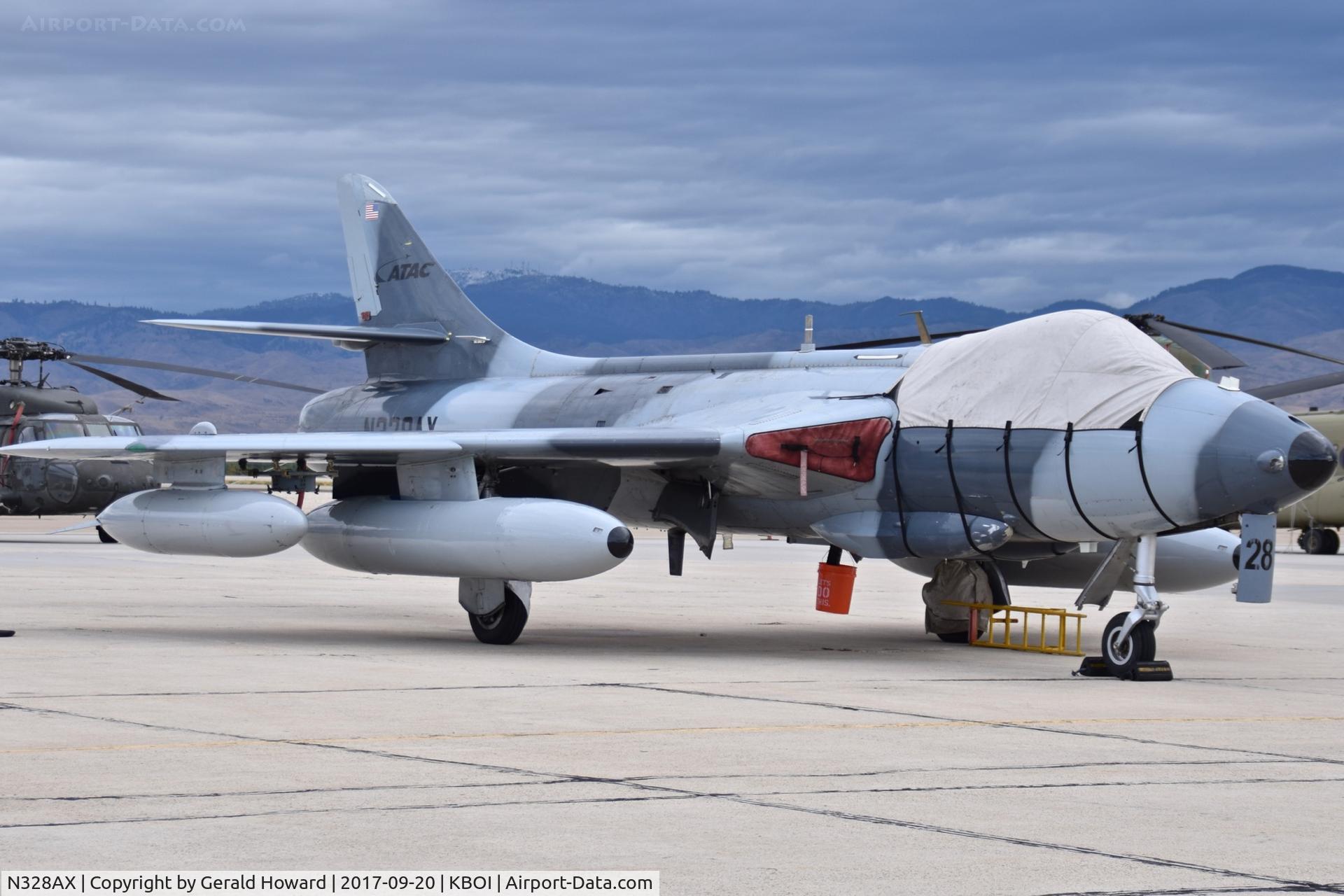 N328AX, 1958 Hawker Hunter Mk.58 C/N 41H-697398, parked on south GA ramp.