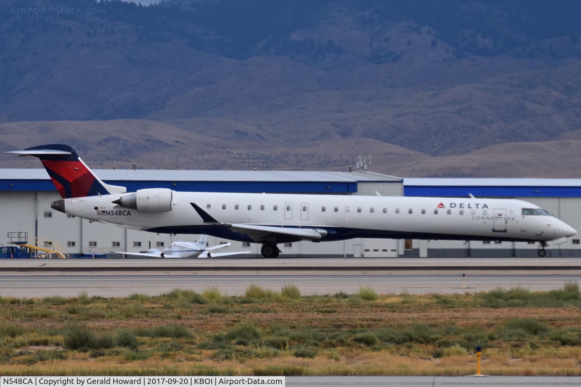 N548CA, 2008 Bombardier CRJ-900ER (CL-600-2D24) C/N 15159, Take off roll on RWY 10L.