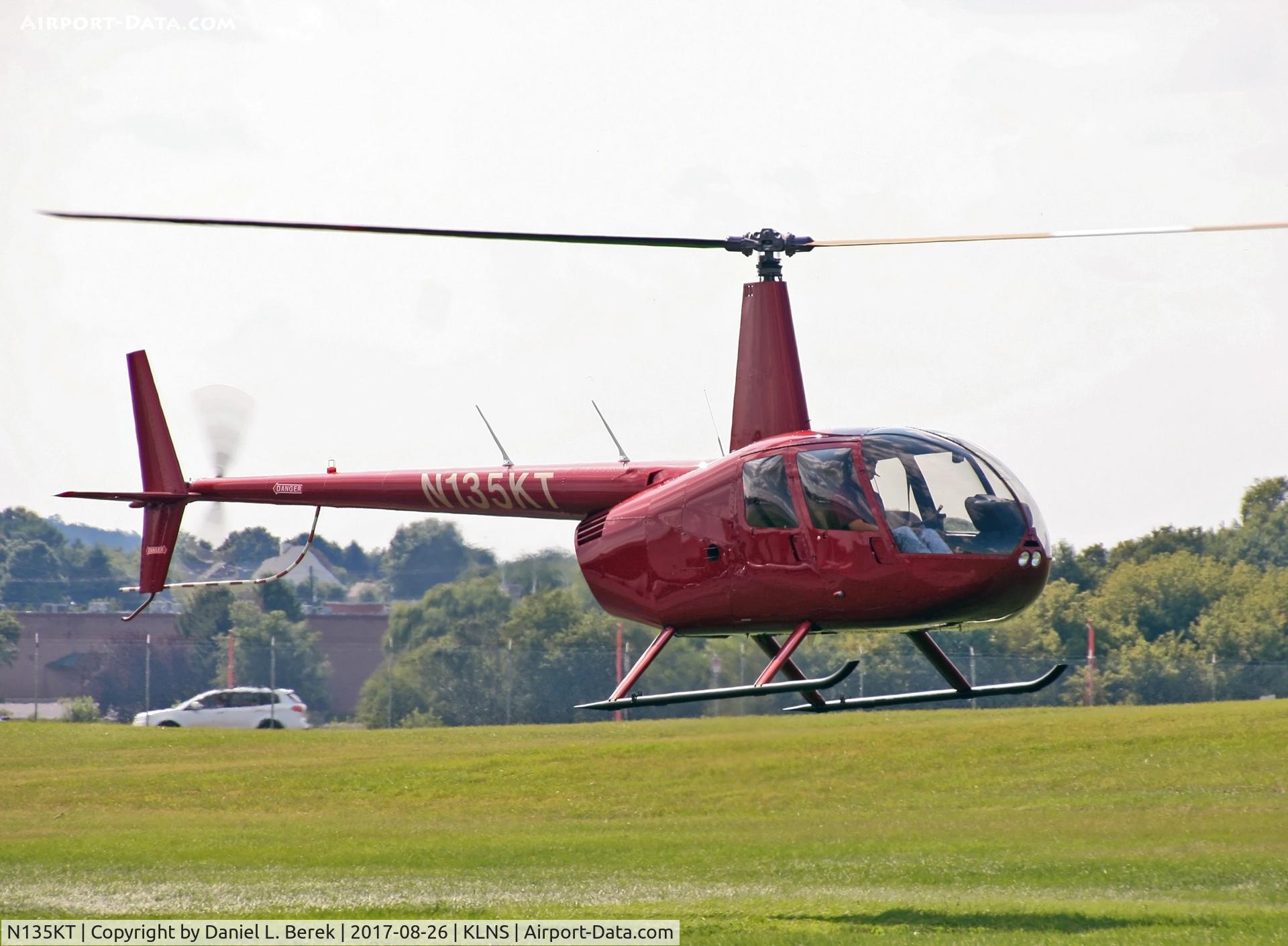 N135KT, 2013 Robinson R44 II C/N 13469, This brightly colored helicopter was offering rides at the 2017 Lancaster airshow.