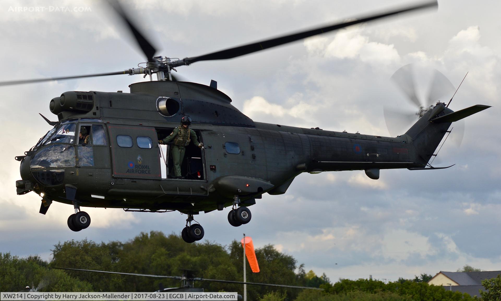 XW214, 1971 Westland Puma HC.1 C/N 1120, Puma Helicopter departing Barton Aerodrome