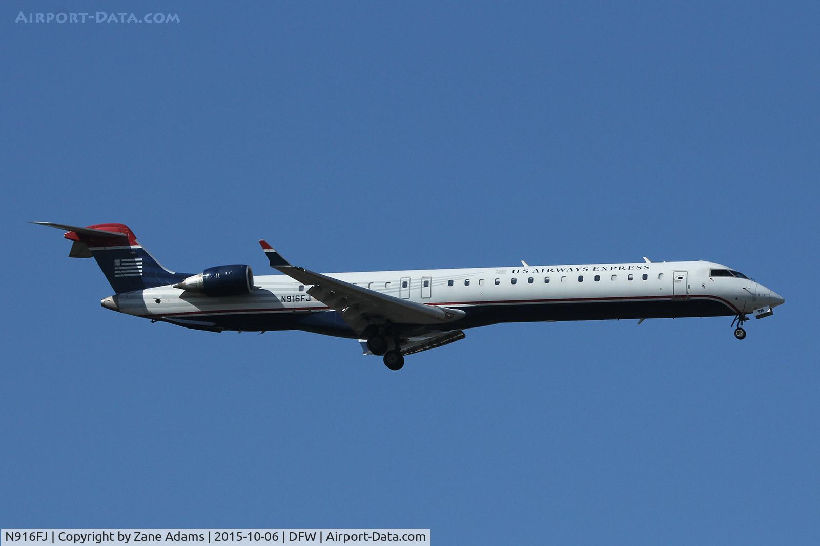 N916FJ, 2004 Bombardier CRJ-900ER (CL-600-2D24) C/N 15016, Arriving at DFW Airport