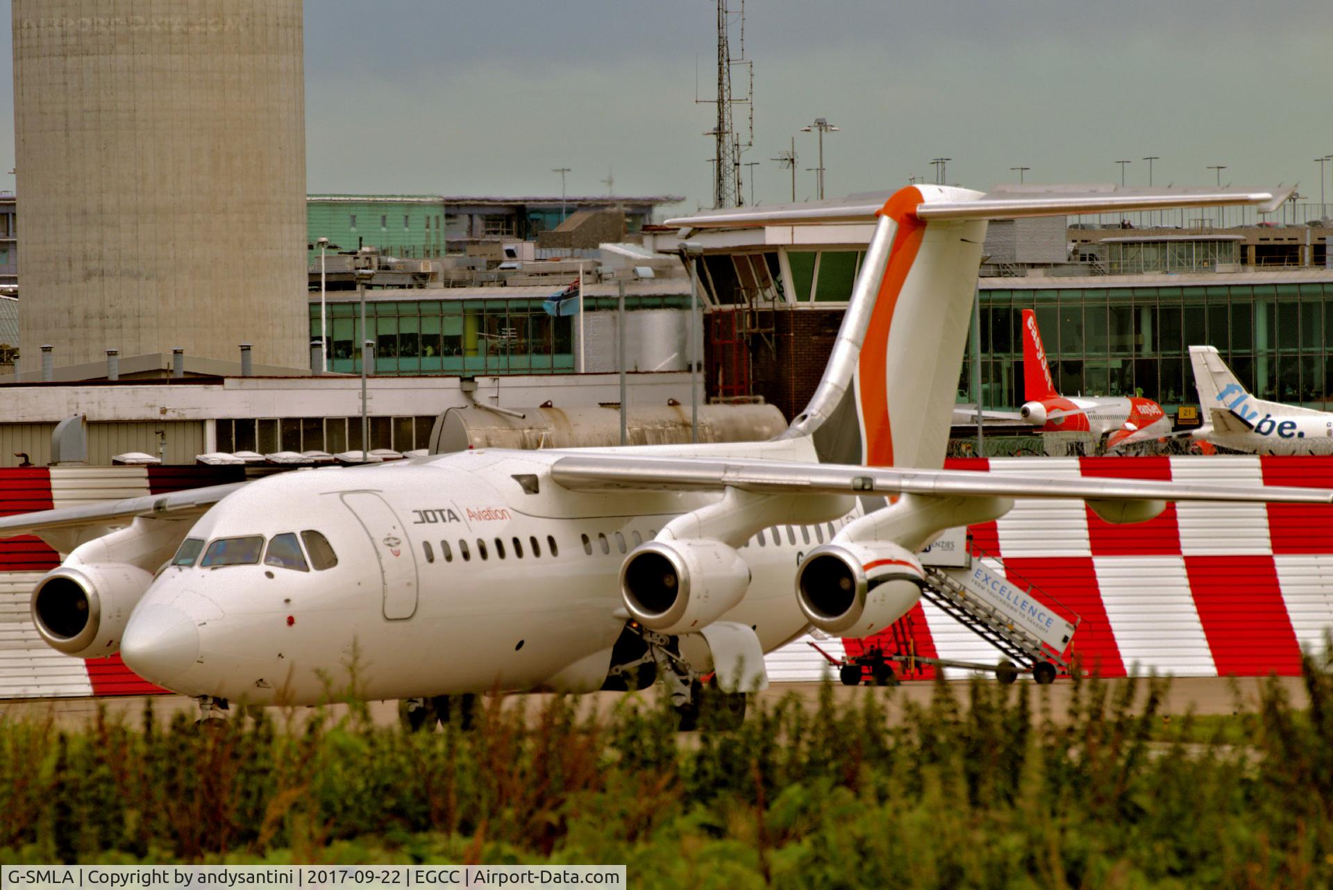 G-SMLA, 1985 British Aerospace BAe.146-200 C/N E2047, being pushed back in the FBO exc ramp egcc uk