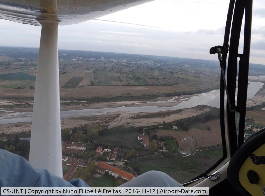 CS-UNT, Fantasy Air Allegro 2000 C/N 04-712, In flight over Tagus river.