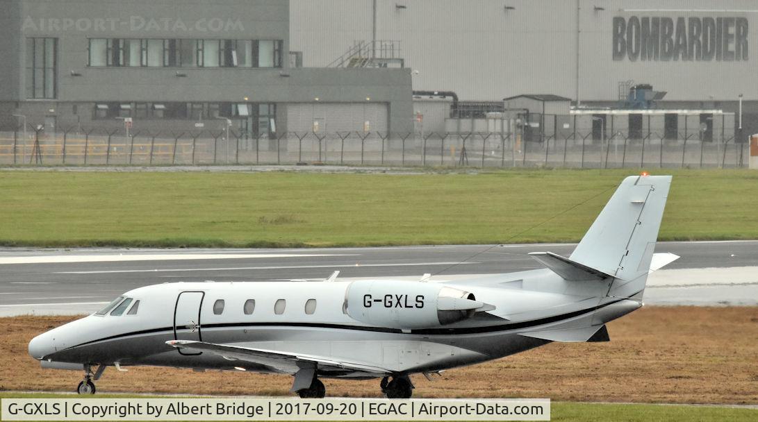 G-GXLS, 2005 Cessna 560XLS Citation Excel C/N 560-5608, G-GXLS at a wet and miserable Belfast City.