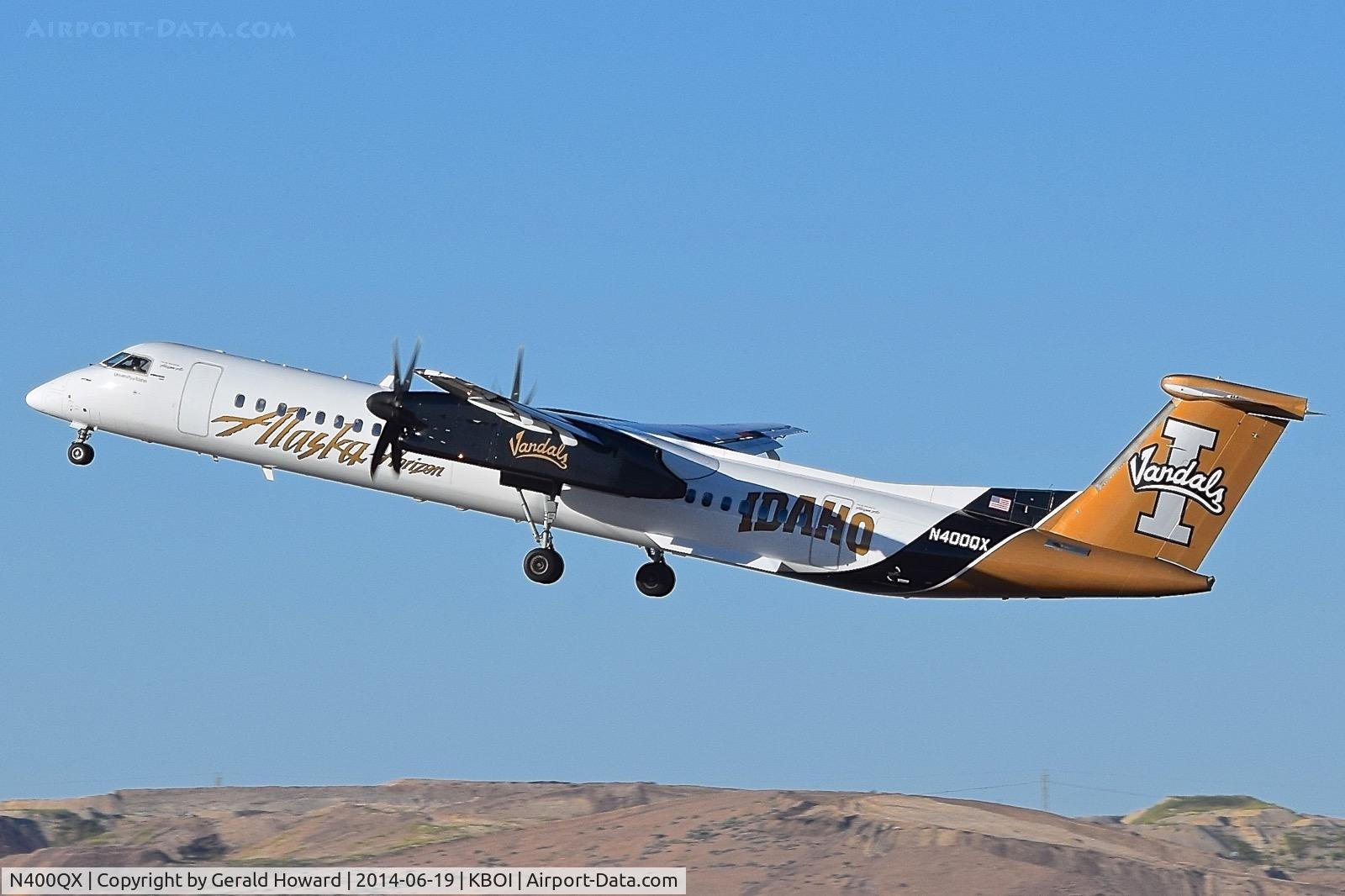 N400QX, 2000 Bombardier DHC-8-402 Dash 8 C/N 4030, Departing RWY 10R.