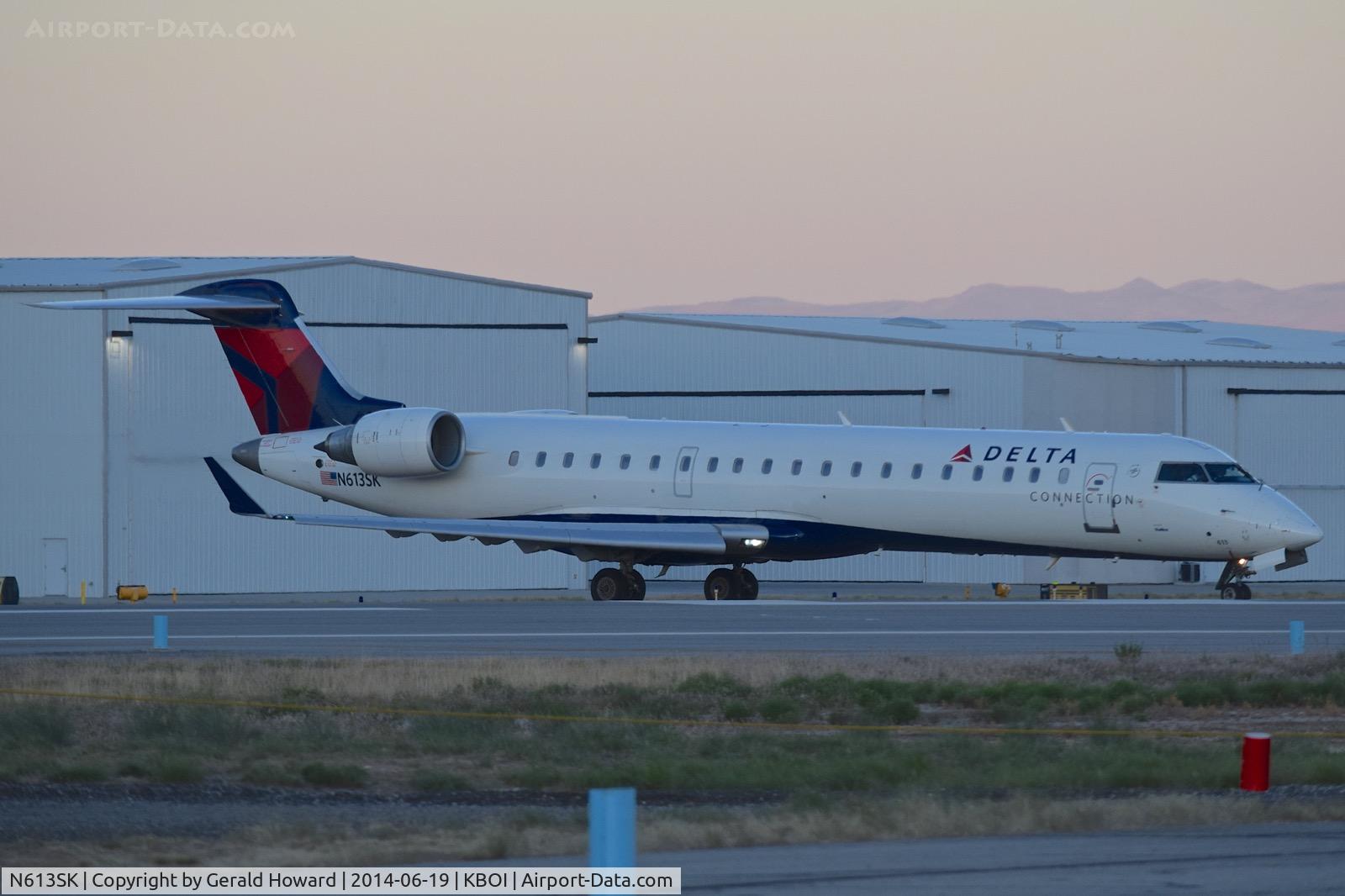 N613SK, 2002 Bombardier CRJ-701 (CL-600-2C10) Regional Jet C/N 10038, Taxiing on Juliet to RWY 10R.