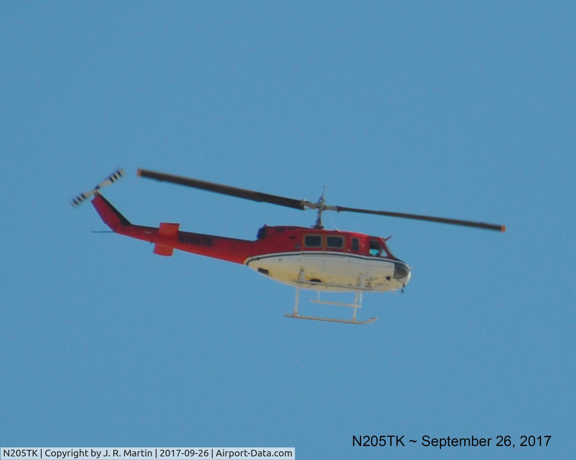 N205TK, 1973 Bell 205A-1 C/N 30131, Flying over Lancaster, California