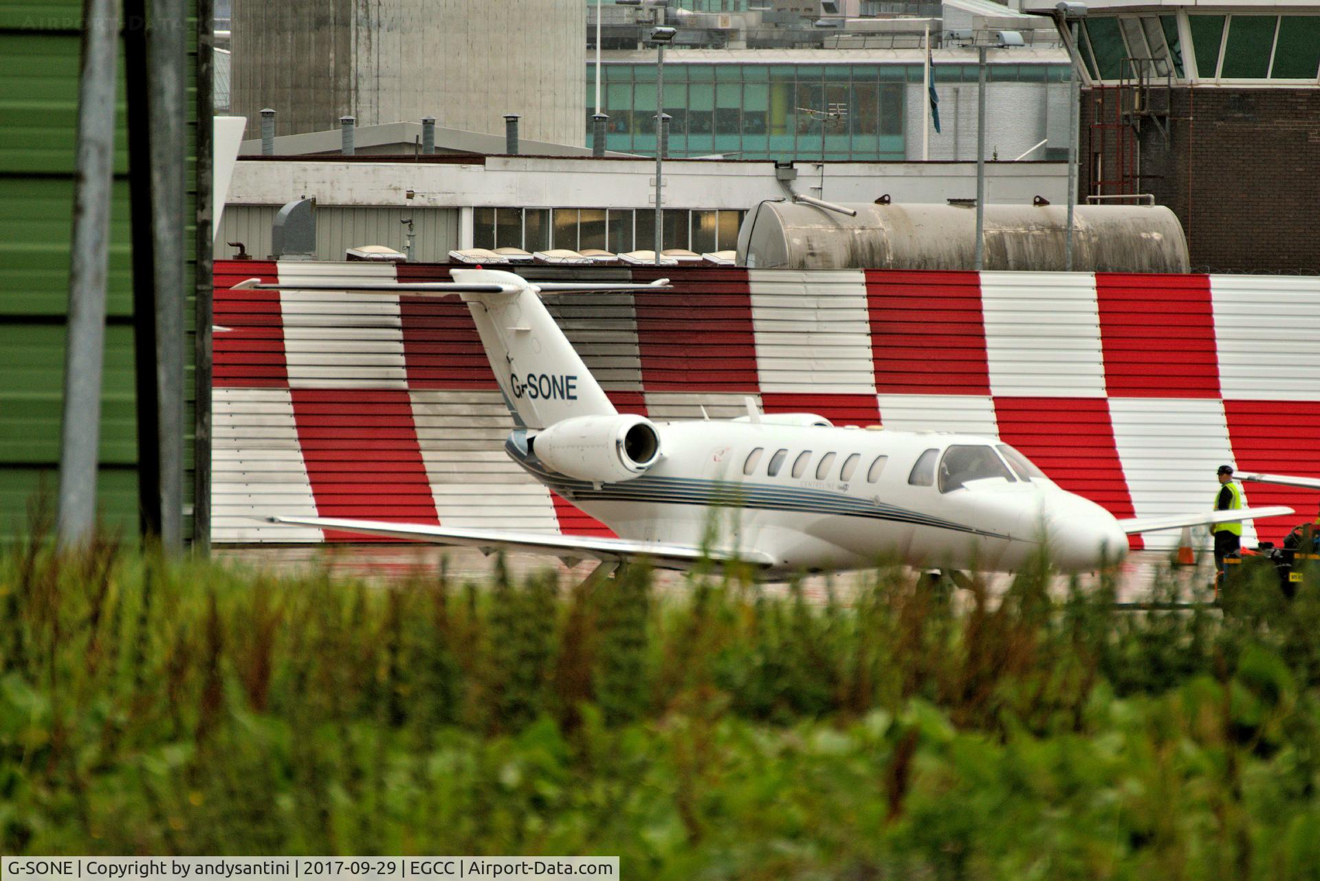 G-SONE, 2001 Cessna 525A CitationJet CJ2 C/N 525A-0031, being pused back on the [FBO exc ramp]