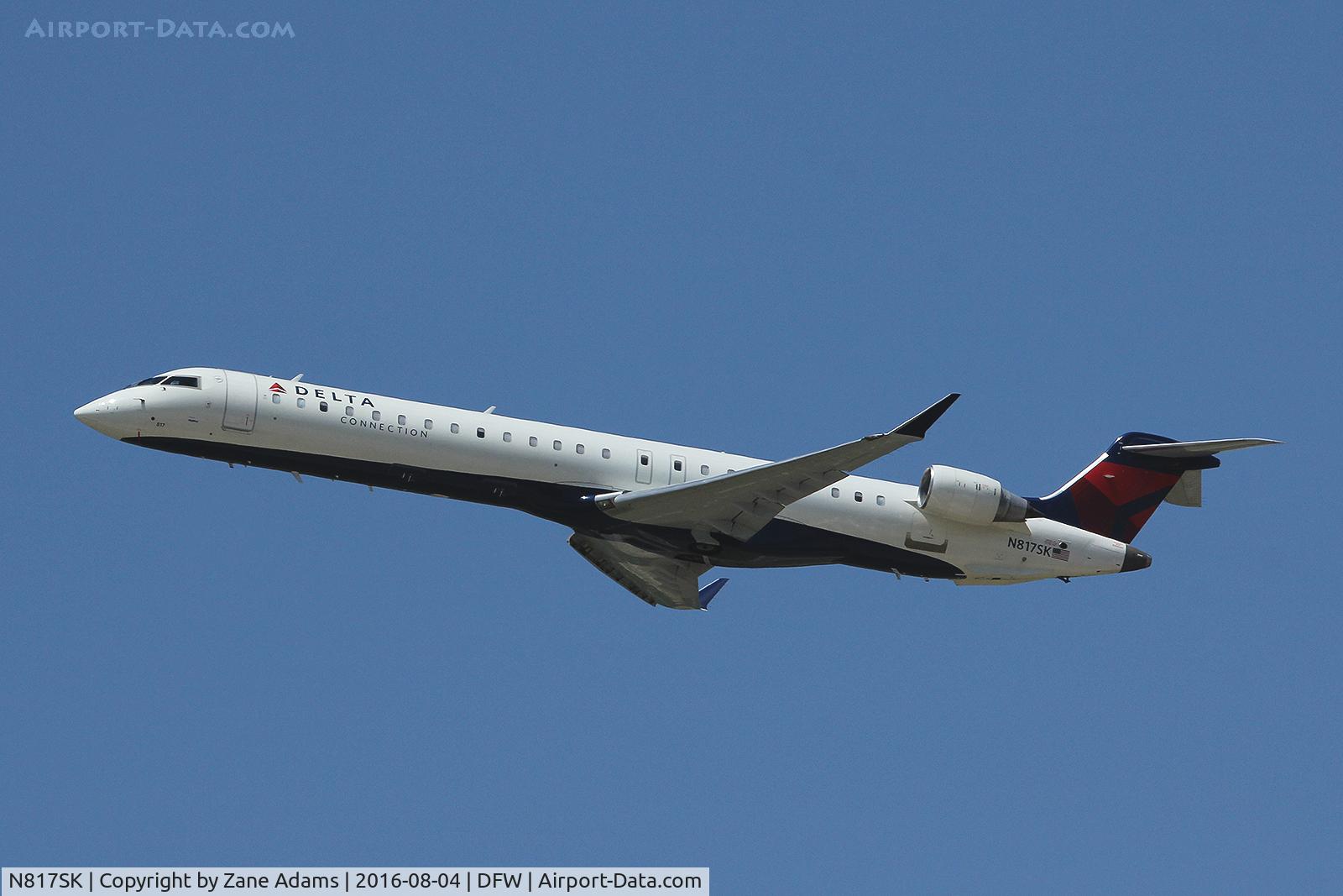 N817SK, 2006 Bombardier CRJ-900ER (CL-600-2D24) C/N 15107, Departing DFW Airport
