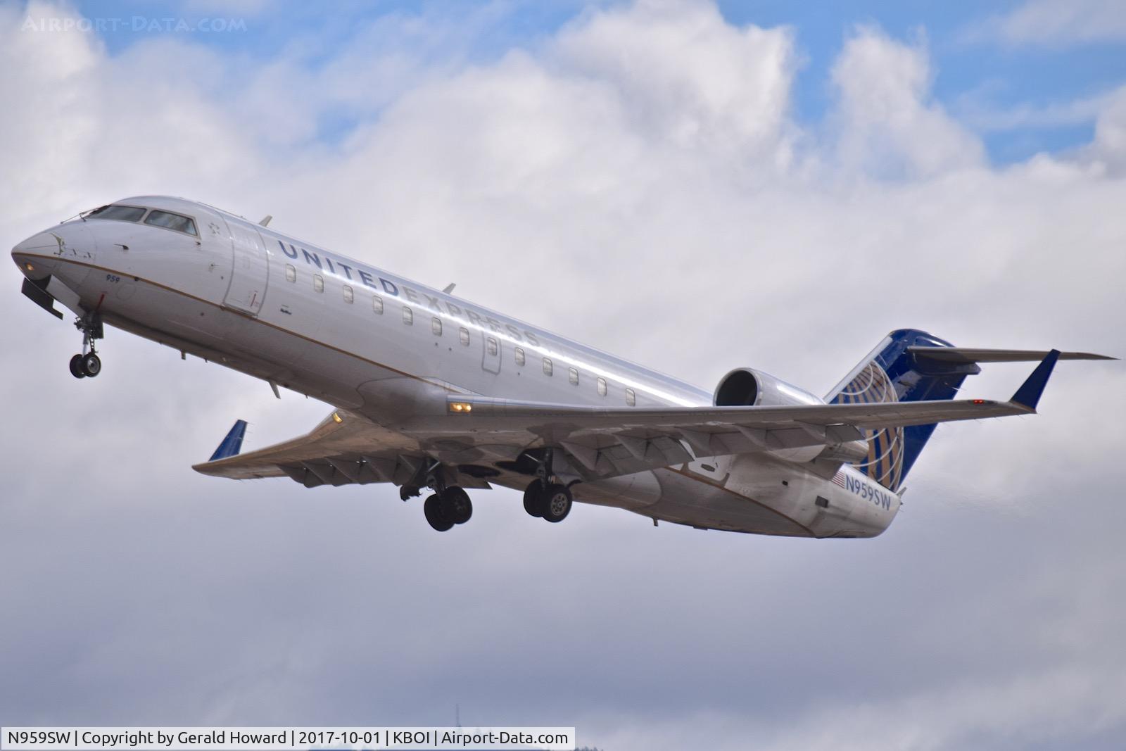 N959SW, 2003 Canadair CL-600-2B19 Regional Jet CRJ-200LR C/N 7840, Departing RWY 28L.