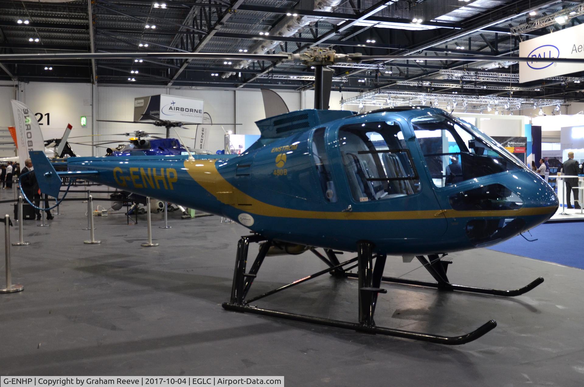 G-ENHP, 2005 Enstrom 480B C/N 5084, Parked inside the ExCel Centre, London, for Helitech 2017.