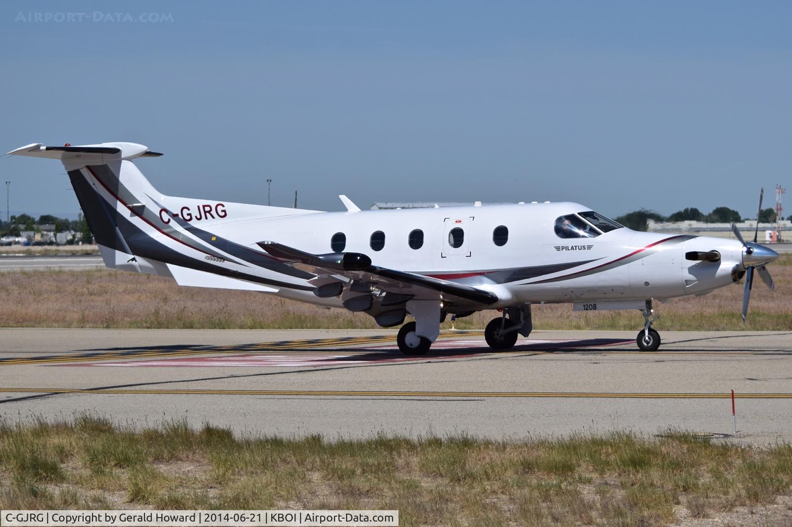C-GJRG, 2010 Pilatus PC-12/47E C/N 1208, Taxiing to north GA ramp.