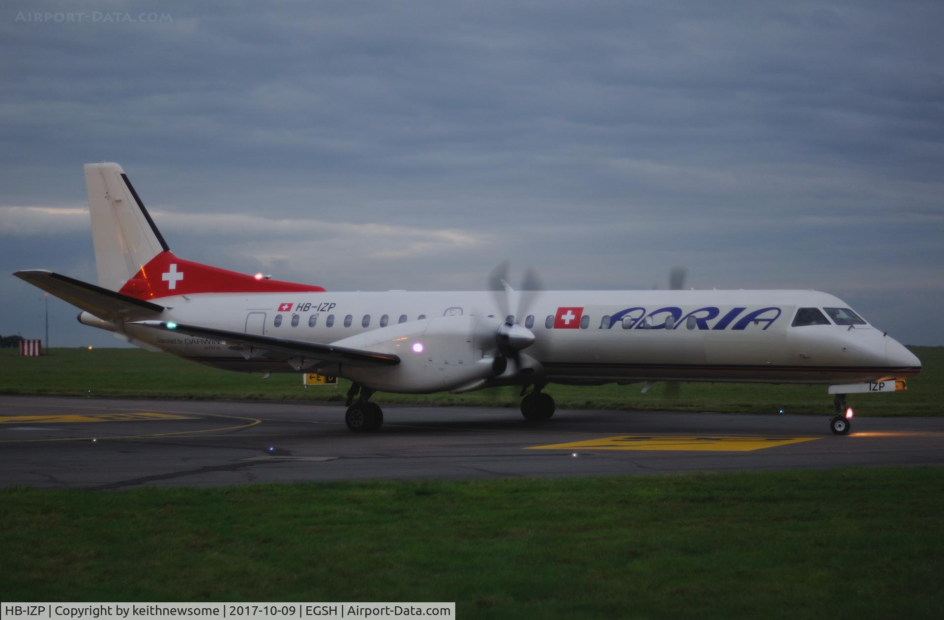 HB-IZP, 1996 Saab 2000 C/N 2000-031, Returning from Aberdeen at dusk.