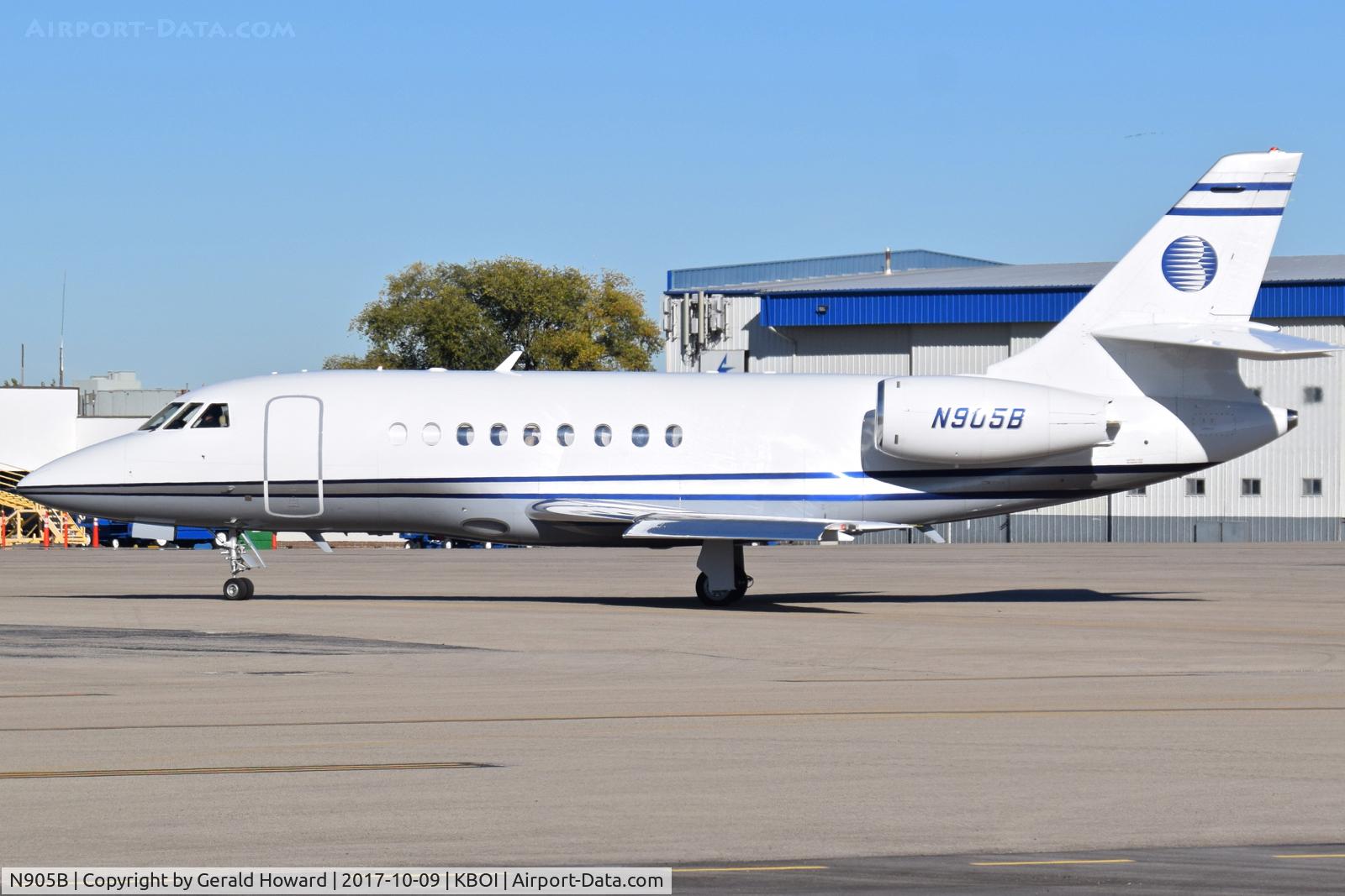 N905B, 2001 Pilatus PC-12/45 C/N 414, Taxiing off the north GA ramp.  2000 Dassault Falcon 2000, c/n 1189.