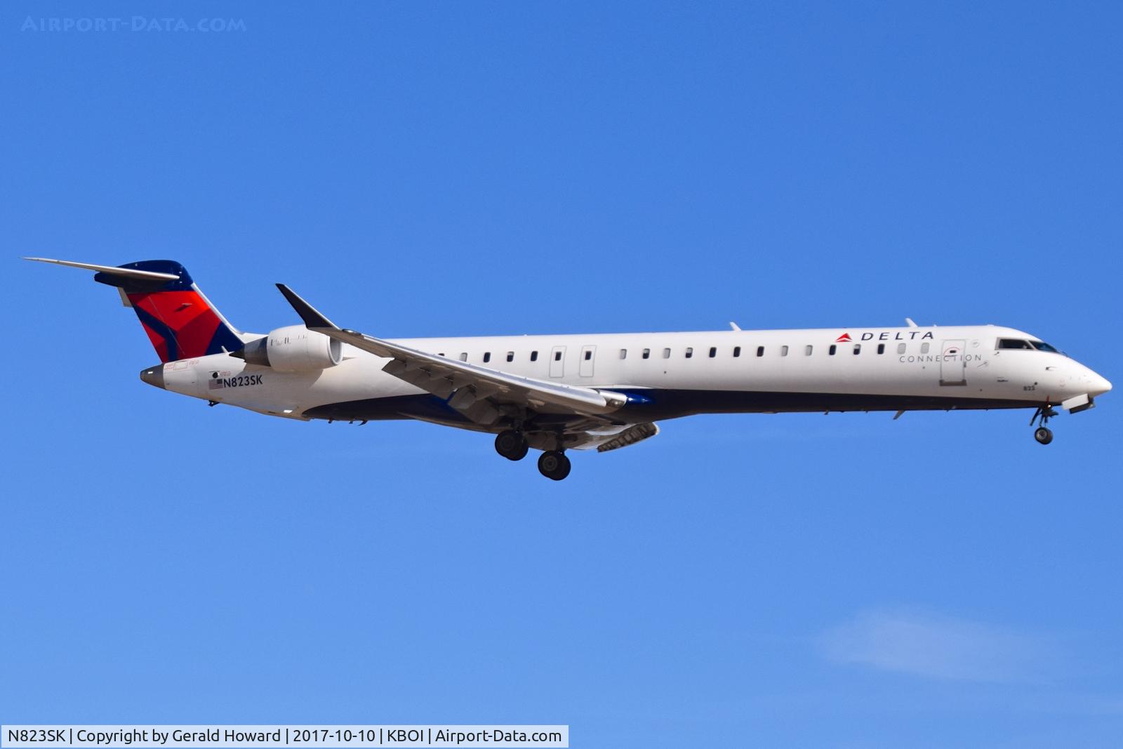 N823SK, 2008 Bombardier CRJ-900ER (CL-600-2D24) C/N 15205, Landing RWY 10L.