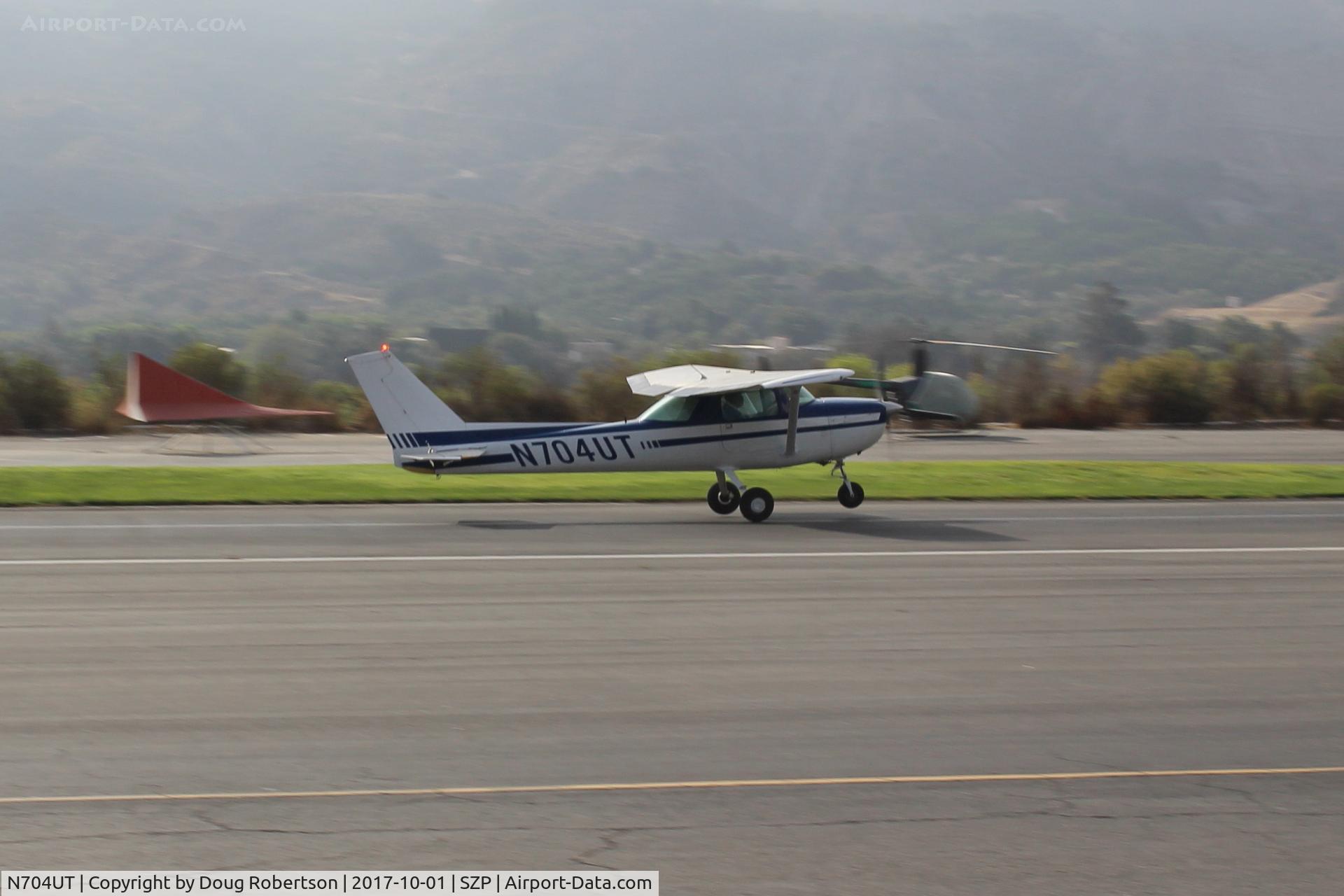 N704UT, 1976 Cessna 150M C/N 15078891, 1976 Cessna 150M, Continental O-200 100 Hp, takeoff roll Twy 22