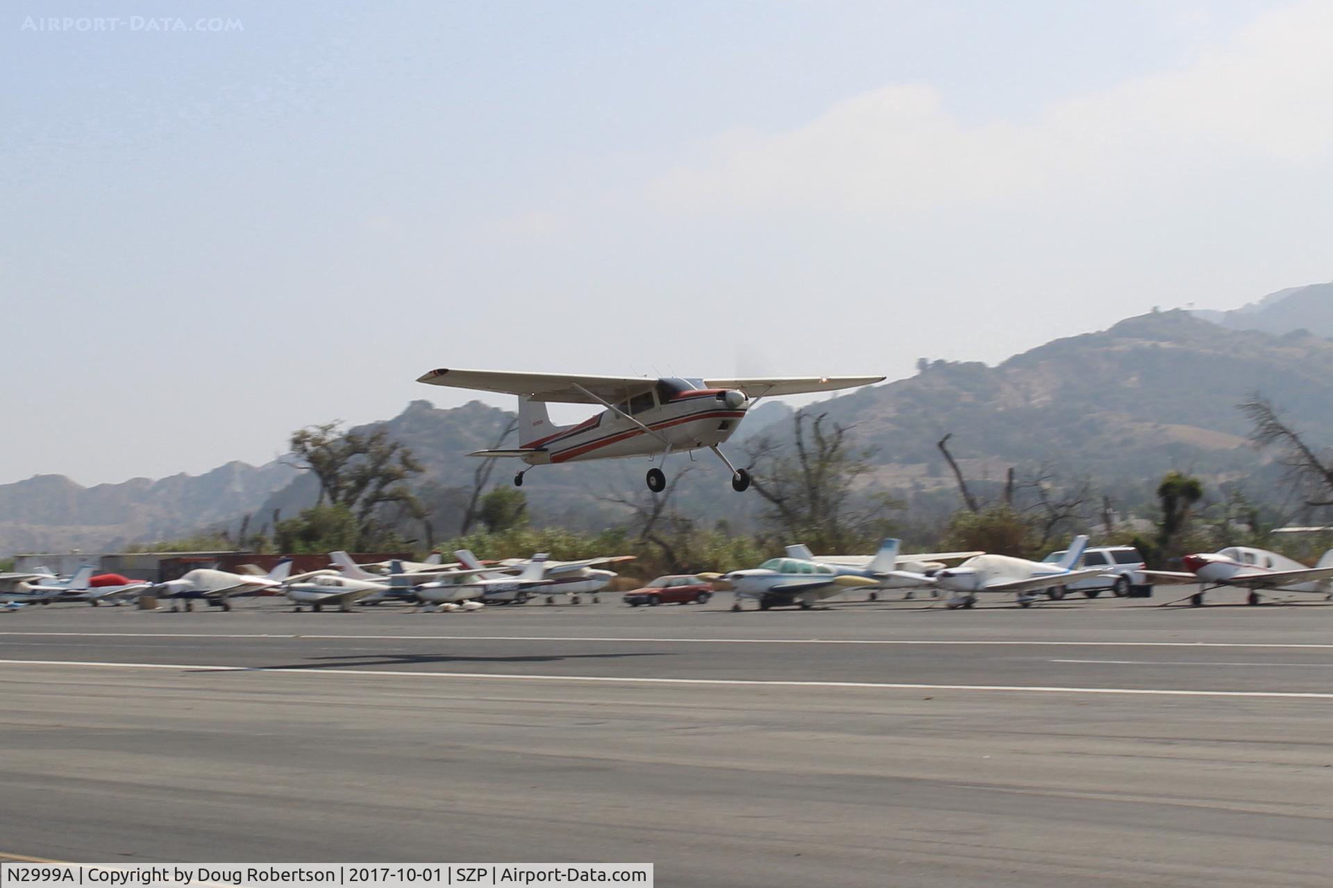 N2999A, 1953 Cessna 180 C/N 30199, 1953 Cessna 180, Continental O-470-A 225 Hp, another takeoff climb Rwy 22