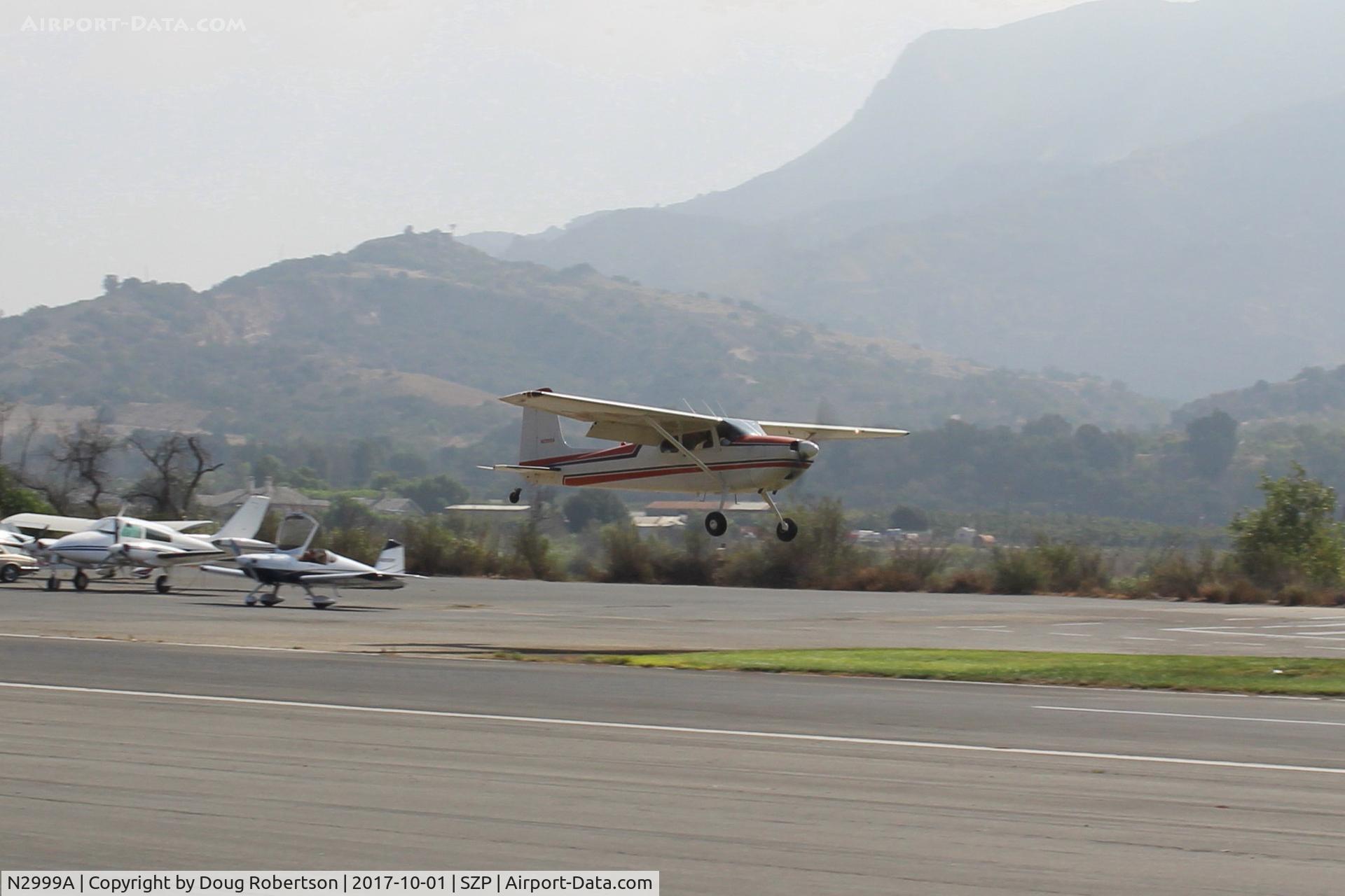 N2999A, 1953 Cessna 180 C/N 30199, 1953 Cessna 180, Continental O-470-A 225 Hp, on final Rwy 22L grass