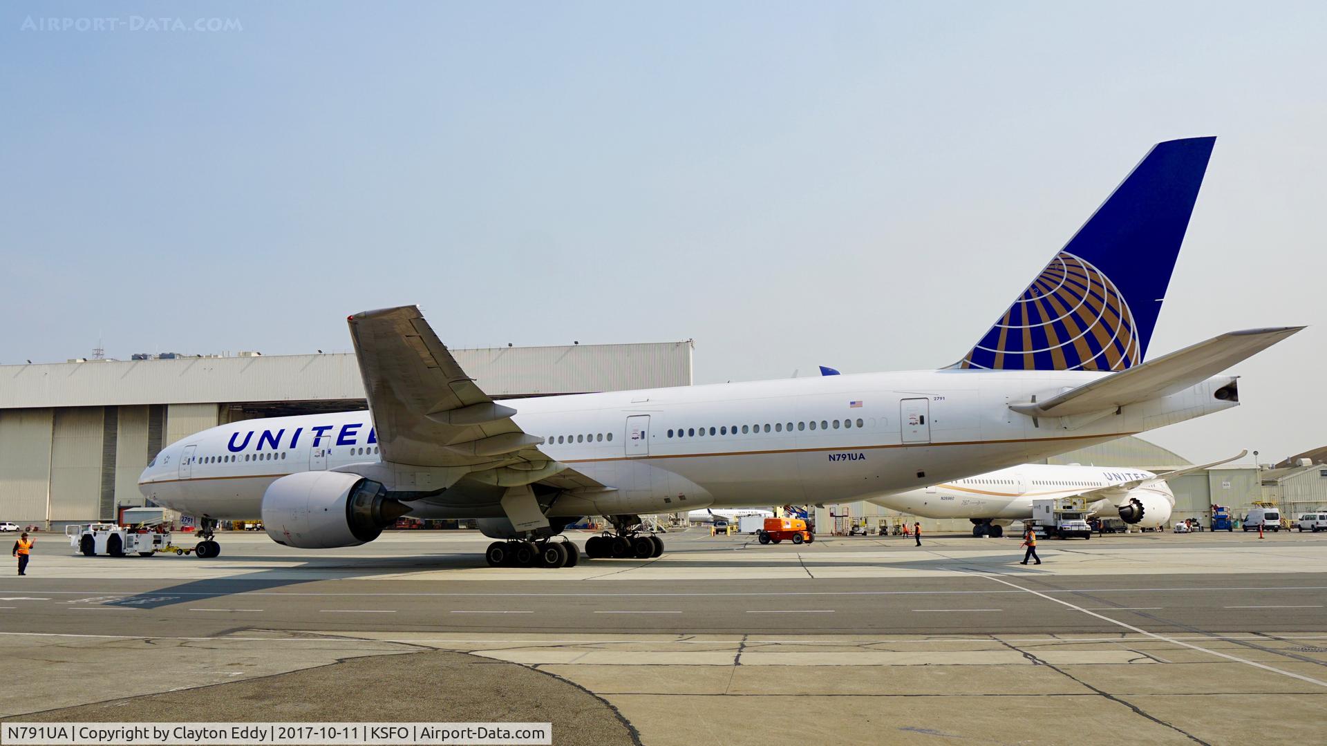 N791UA, 1997 Boeing 777-222 C/N 26933, Smoky fires up north. SFO 2017.