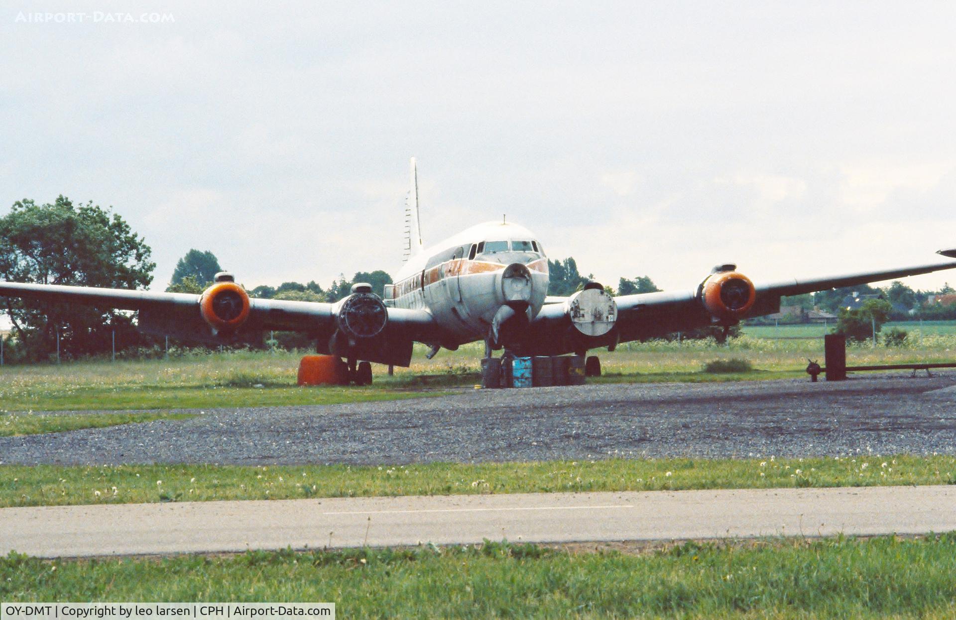 OY-DMT, 1953 Douglas DC-7 C/N 44136, Copenhagen 1985 on Firedump
