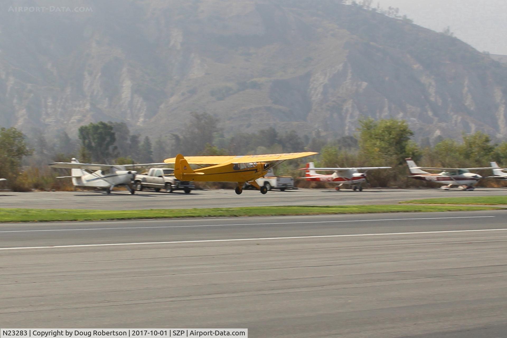 N23283, 1939 Piper J3C-65 Cub Cub C/N 3038, 1939 Piper J3C-65 CUB, Continental A&C65 65 Hp, landing Rwy 22L grass