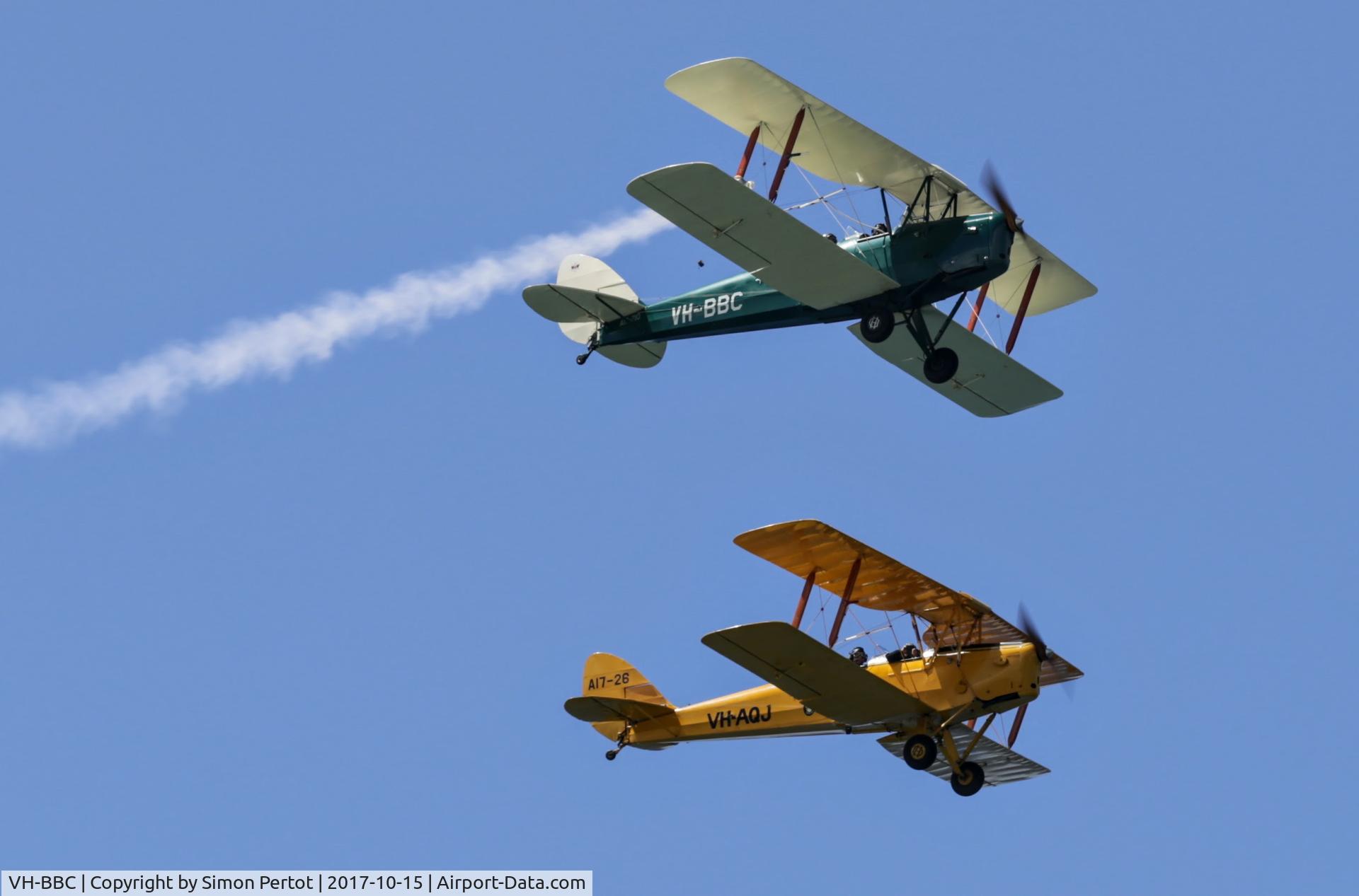 VH-BBC, 1945 De Havilland Australia DH-82A Tiger Moth C/N DHA842, VH-BBC flying with VH-AQJ over Bar Beach, Newcastle, New South Wales, Australia on 15 October 2017.