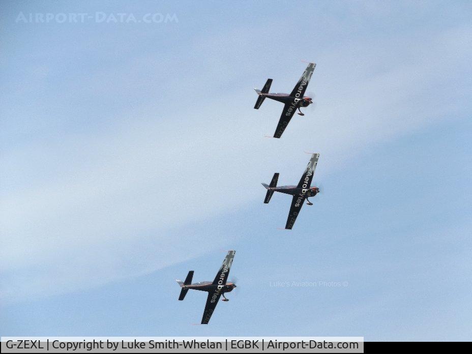 G-ZEXL, 2006 Extra EA-300L C/N 1225, Three ship of the Blades doing their display at Pistons and Props 2017.