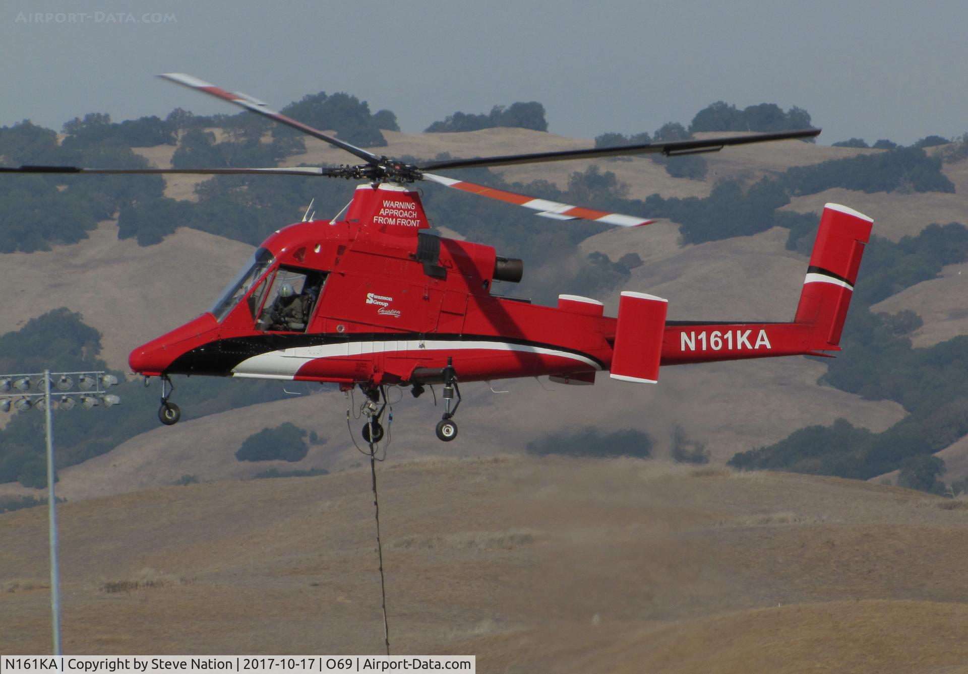 N161KA, 1996 Kaman K-1200 K-Max C/N A94-0016, Swanson Group Aviation (Glendale, OR) 1996 Kaman K-1200 K-MAX returning to Petaluma Municipal Airport, CA temporary home base from making water drops on the devastating October 2017 Northern California wildfires