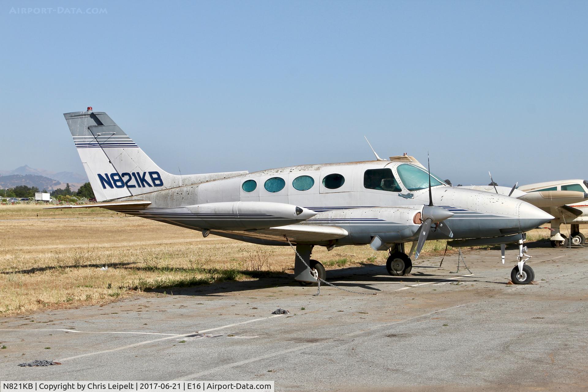 N821KB, 1966 Cessna 411 C/N 411-0201, Locally-based 1966 Cessna 411 parked and rotting on the ramp at San Martin Airport, CA.
