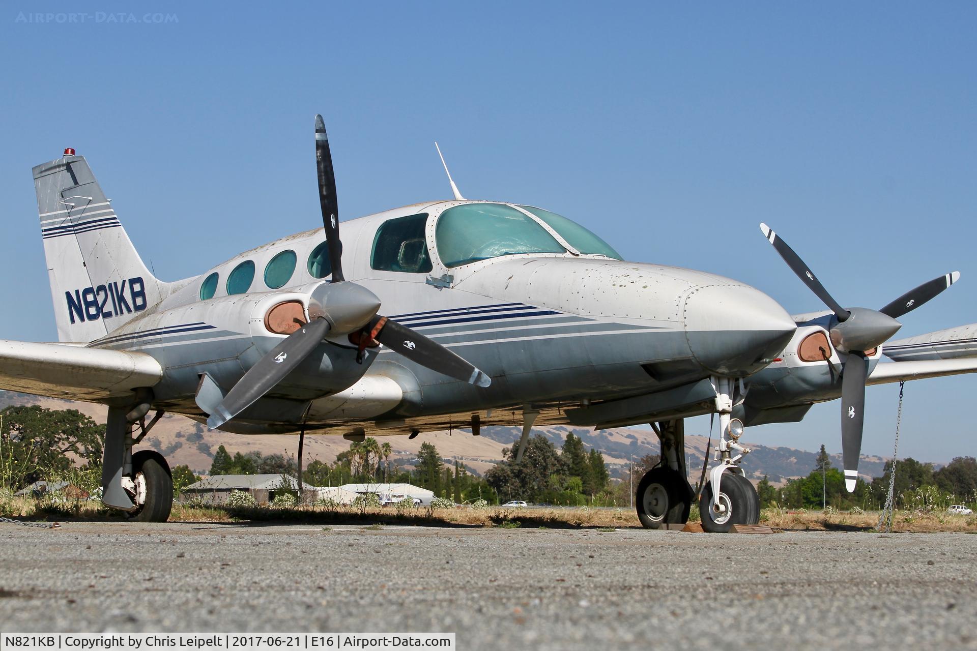 N821KB, 1966 Cessna 411 C/N 411-0201, Locally-based 1966 Cessna 411 parked and rotting on the ramp at San Martin Airport, CA.