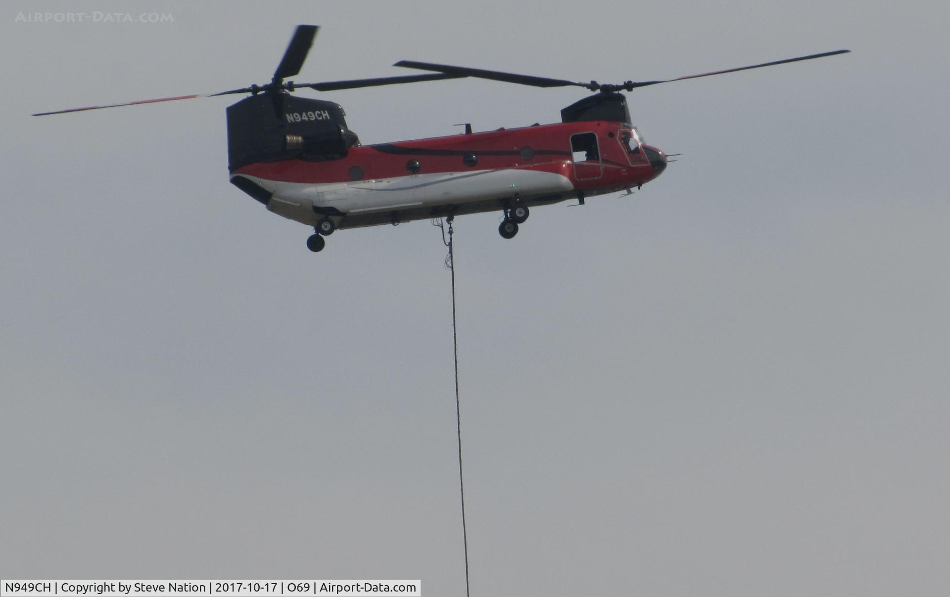N949CH, 1990 Boeing CH-47D Chinook C/N M.3357, Helifire Group LLC (Missoula, MT) 1990 Boeing CH-47D returning to Petaluma Municipal Airport, CA temporary home base after making water drops on the devastating October 2017 Northern California wildfires
