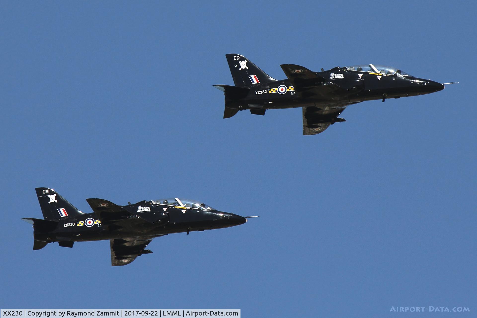 XX230, 1978 Hawker Siddeley Hawk T.1A C/N 066/312066, Hawk T.1As formation being XX230 and XX332 both sporting 100Sqd markings from the Royal Air Force during run in and break on RW13 Malta