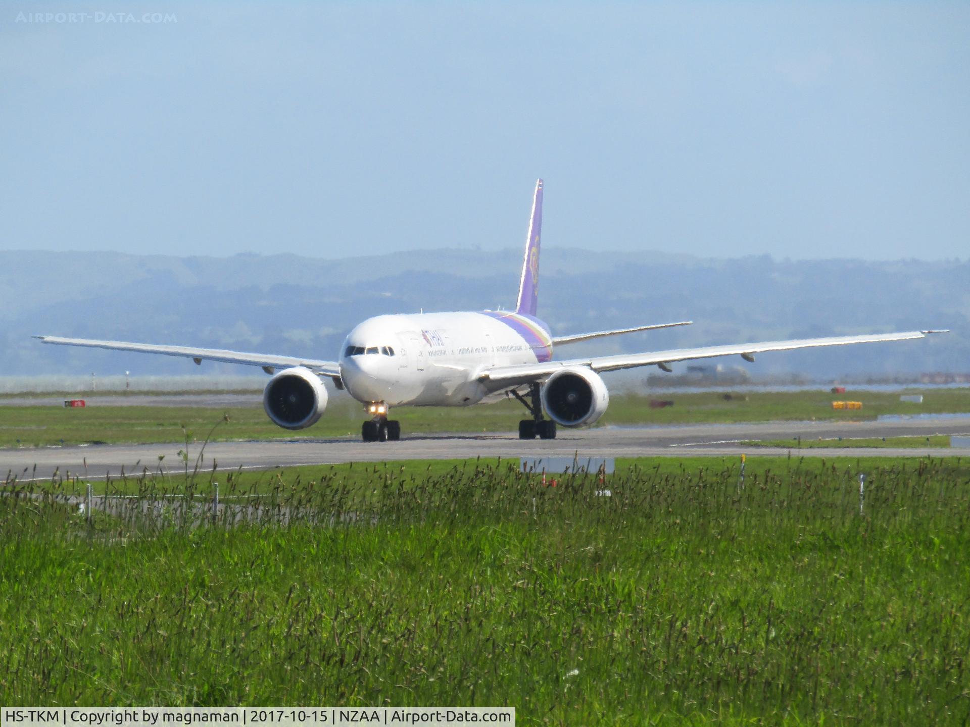 HS-TKM, 2013 Boeing 777-3AL/ER C/N 41522, long range shot on taxyway - from viewing car park