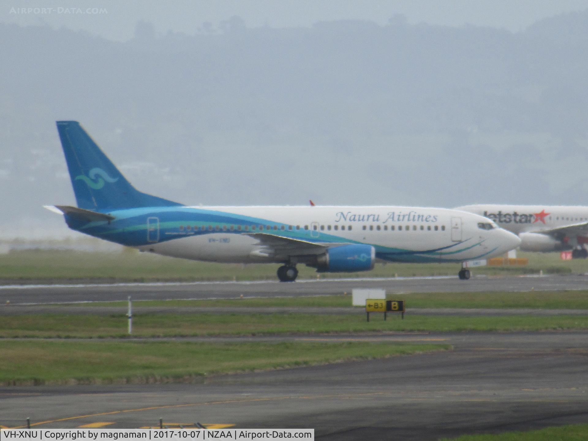 VH-XNU, 1999 Boeing 737-319 C/N 25609, just landed at AKL