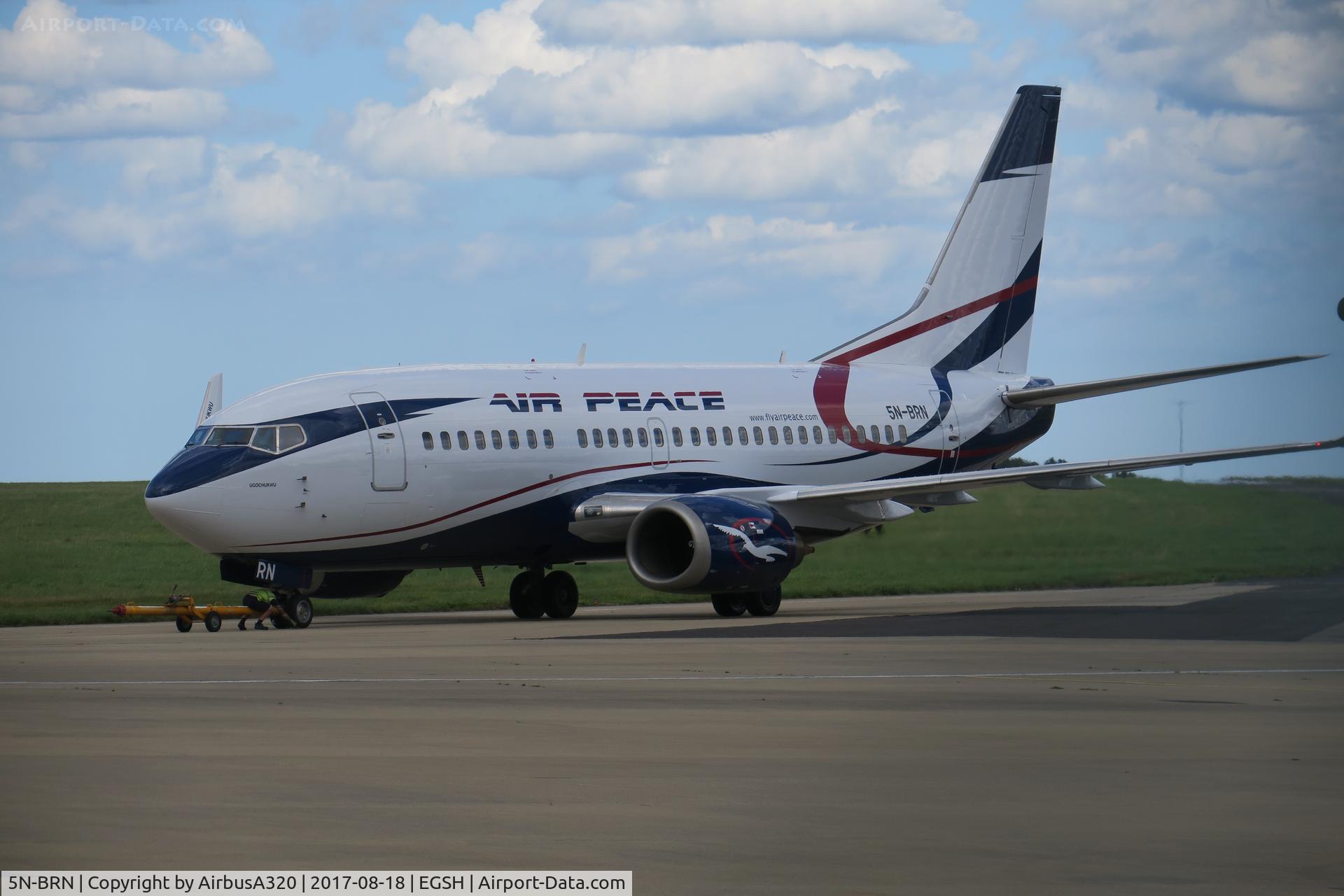 5N-BRN, 1992 Boeing 737-528 C/N 25234, Fresh from repaint with Air Livery seen being push back ready for departure